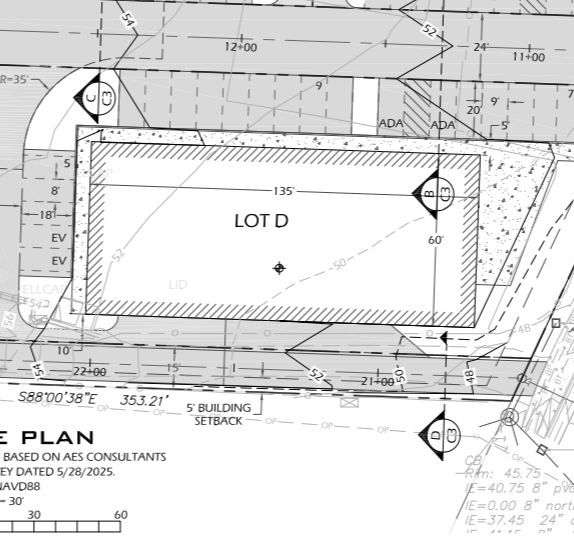 Site plan showing a rectangular parking lot labeled 'LOT D' with dimensions 135 feet, surrounded by roads and pathways, including designated areas for ADA accessibility and building setbacks.