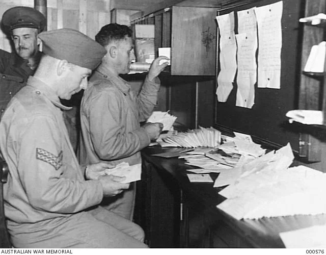 SORTING MAIL ON BOARD THE TRANSPORT. ARMY. ABOARD SHIP.