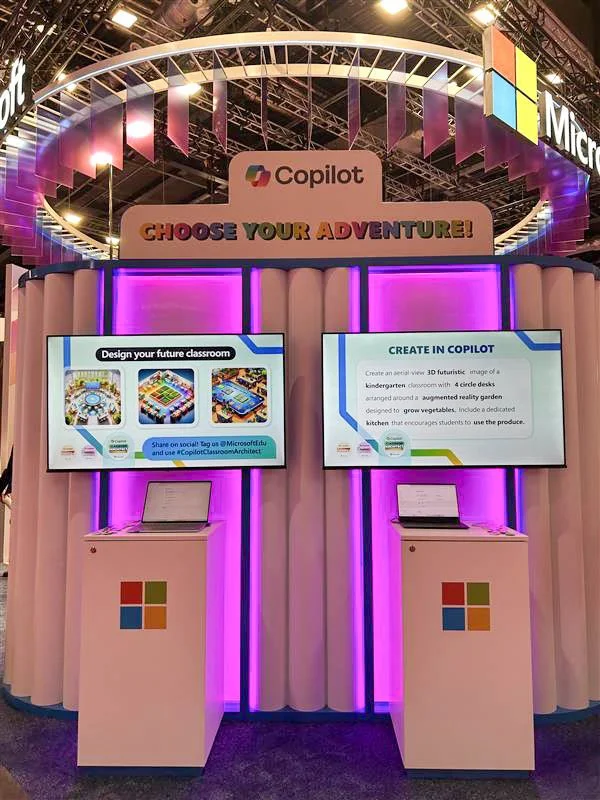 A booth with a sign that says 'Choose Your Adventure!' associated with Copilot, featuring two screens displaying educational content about designing classrooms and creating in Copilot, with two laptops on pedestals below the screens, all accented with purple lighting.