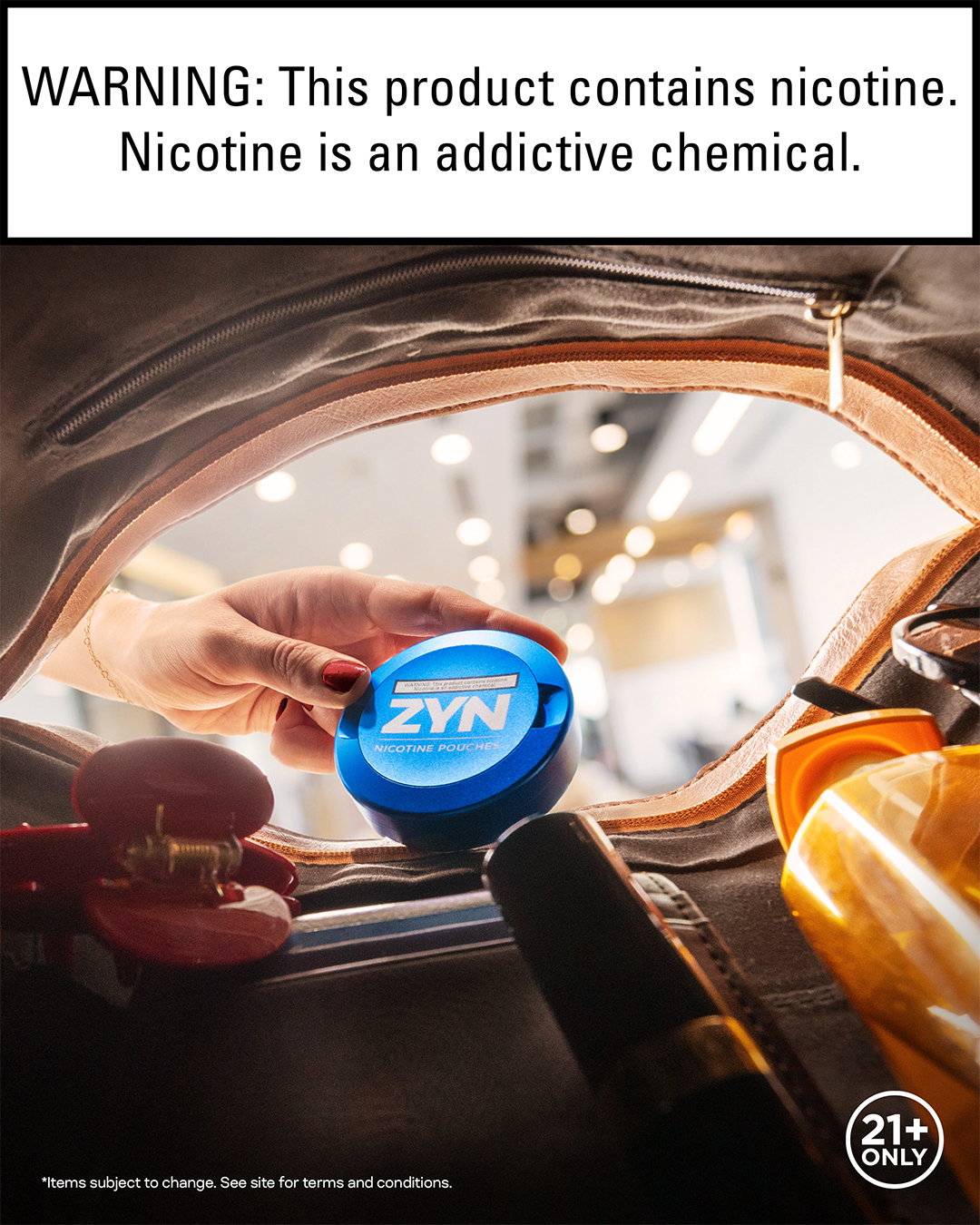 Person placing a container of ZYN nicotine pouches into a bag with other items, including sunglasses and a phone.