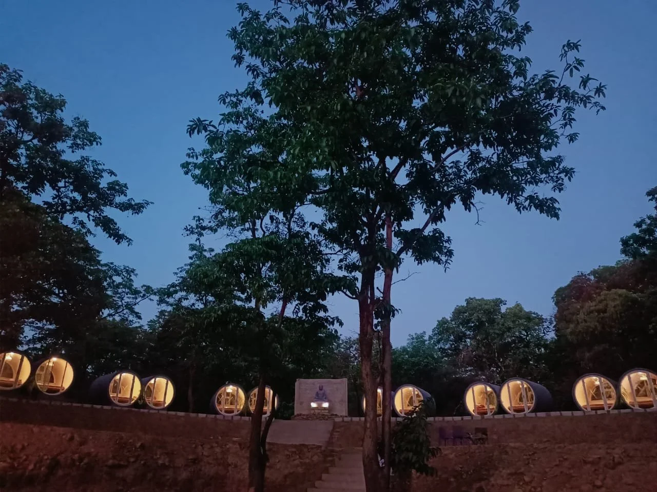 ''Evening view of capsule stay in jungle setting at Wild Monk Dandeli''