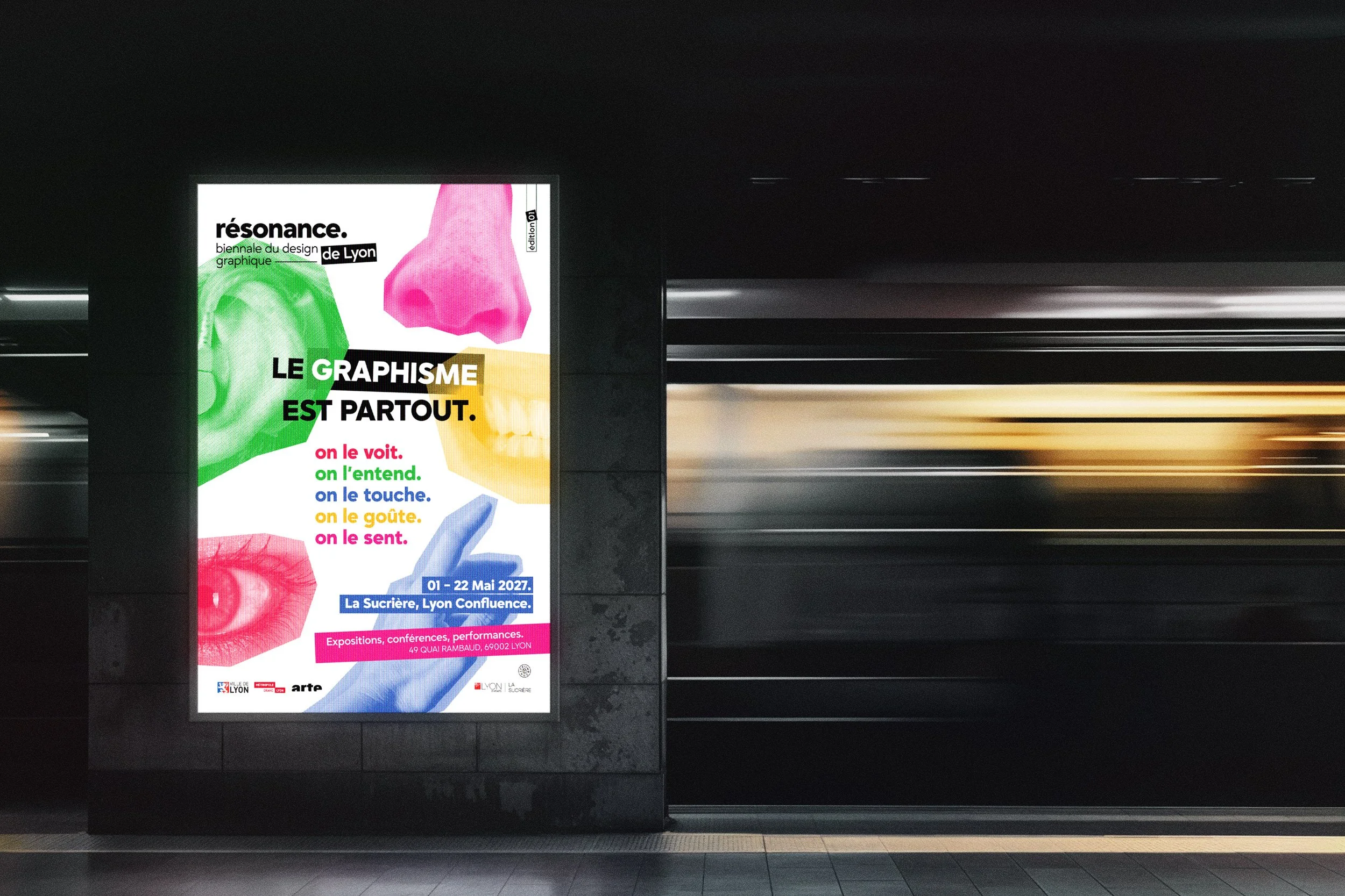 Affiche publicitaire pour une exposition sur le graphisme à la Biennale de Lyon, avec des illustrations de nez, bouche, œil et mains en couleurs vives, contenant des textes en français.