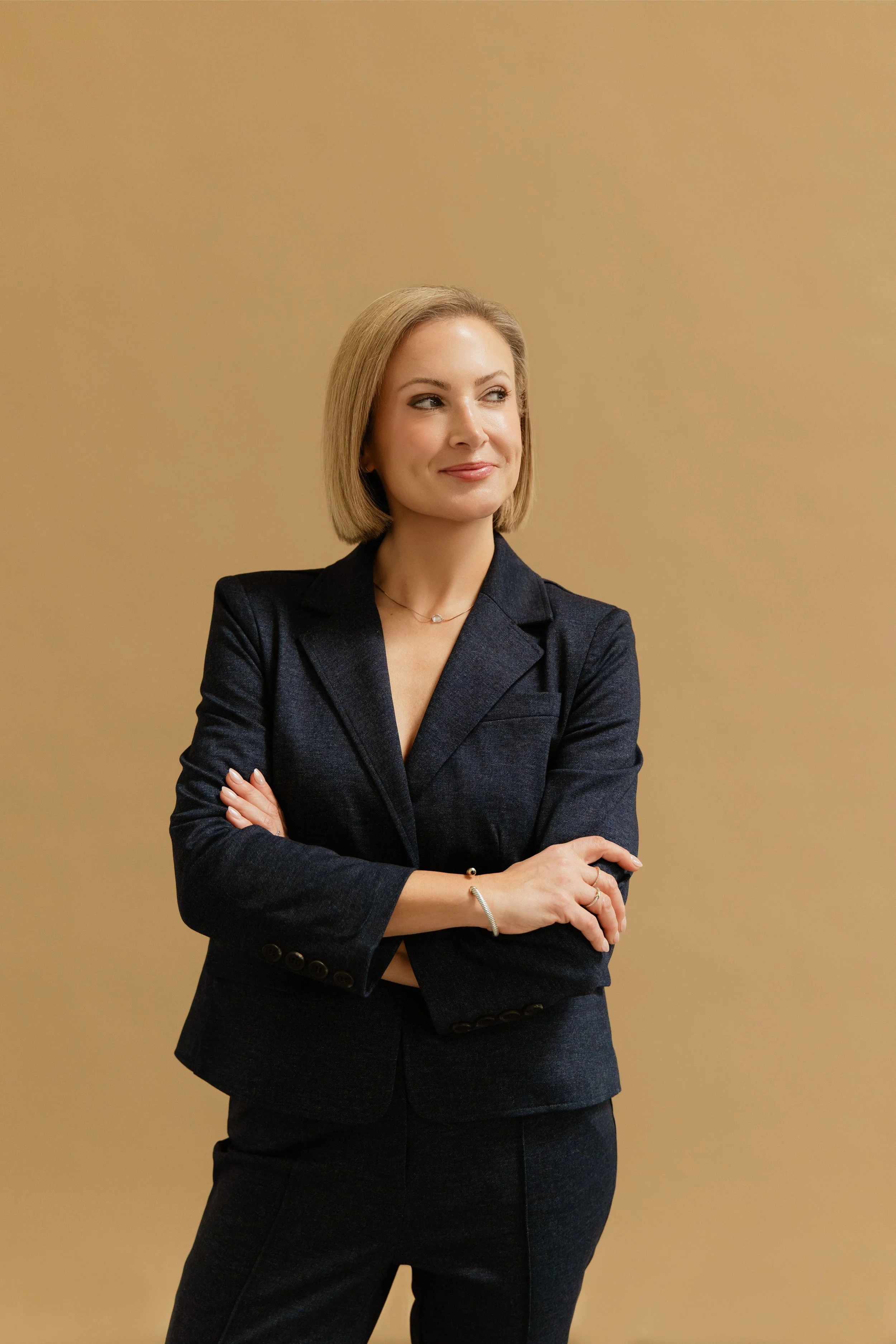 Marissa Kuhl smiling in a professional headshot.
