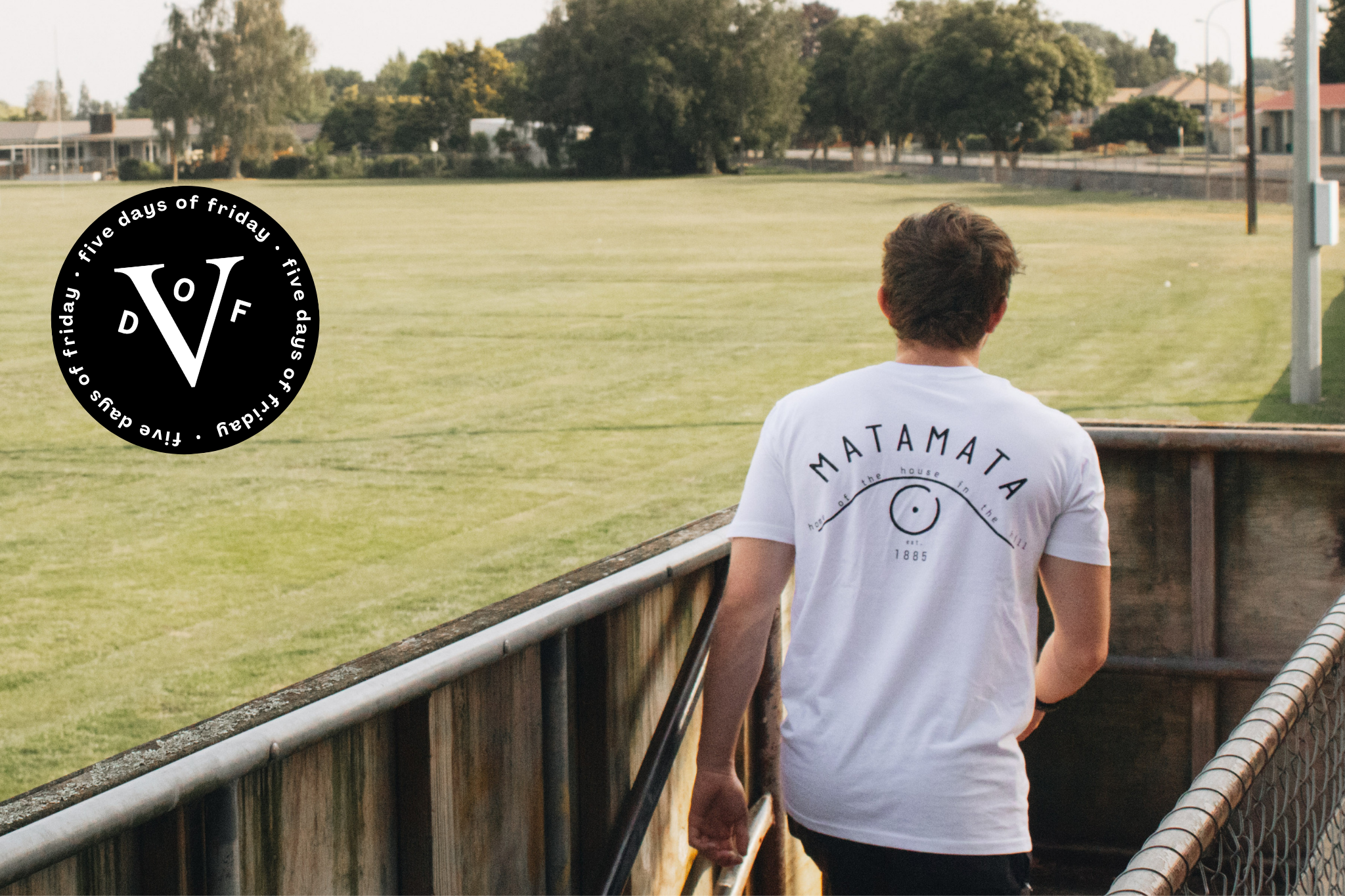 Man wearing Matamata T-Shirt looks over Bedford Park