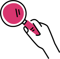 Ein pinkfarbener roter Spielzeugrobbe mit einem Raketenantrieb vor schwarzem Hintergrund.