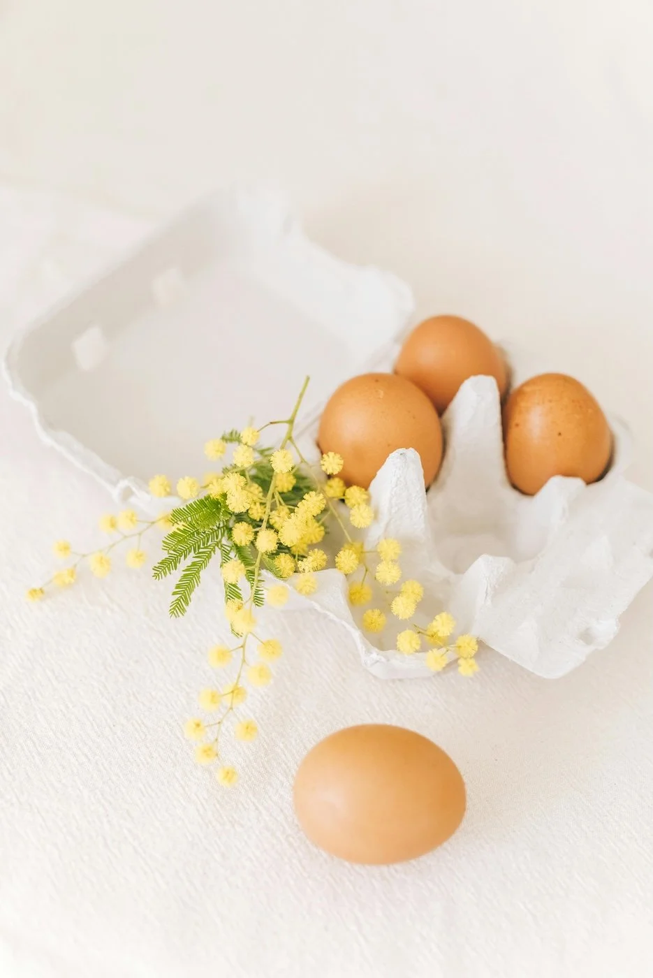 Fresh eggs and natural ingredients representing sustainable nutrition habits and food-first health guidance from Naturally Nourished Nutrition Clinical Nutritionist Tasmania.
