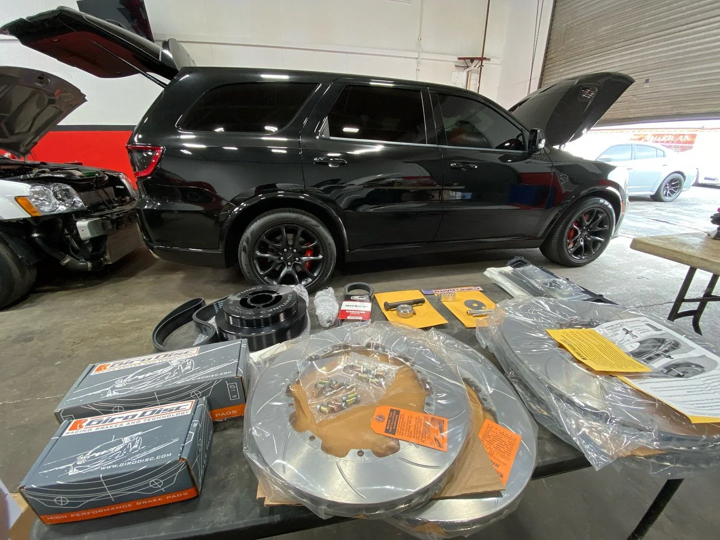 Hellcat Durango in for some upgrades, brakes an rotors along with a keyed crank, incognito crank pulley ,supercharger spacers an blanket to keep them high temps away