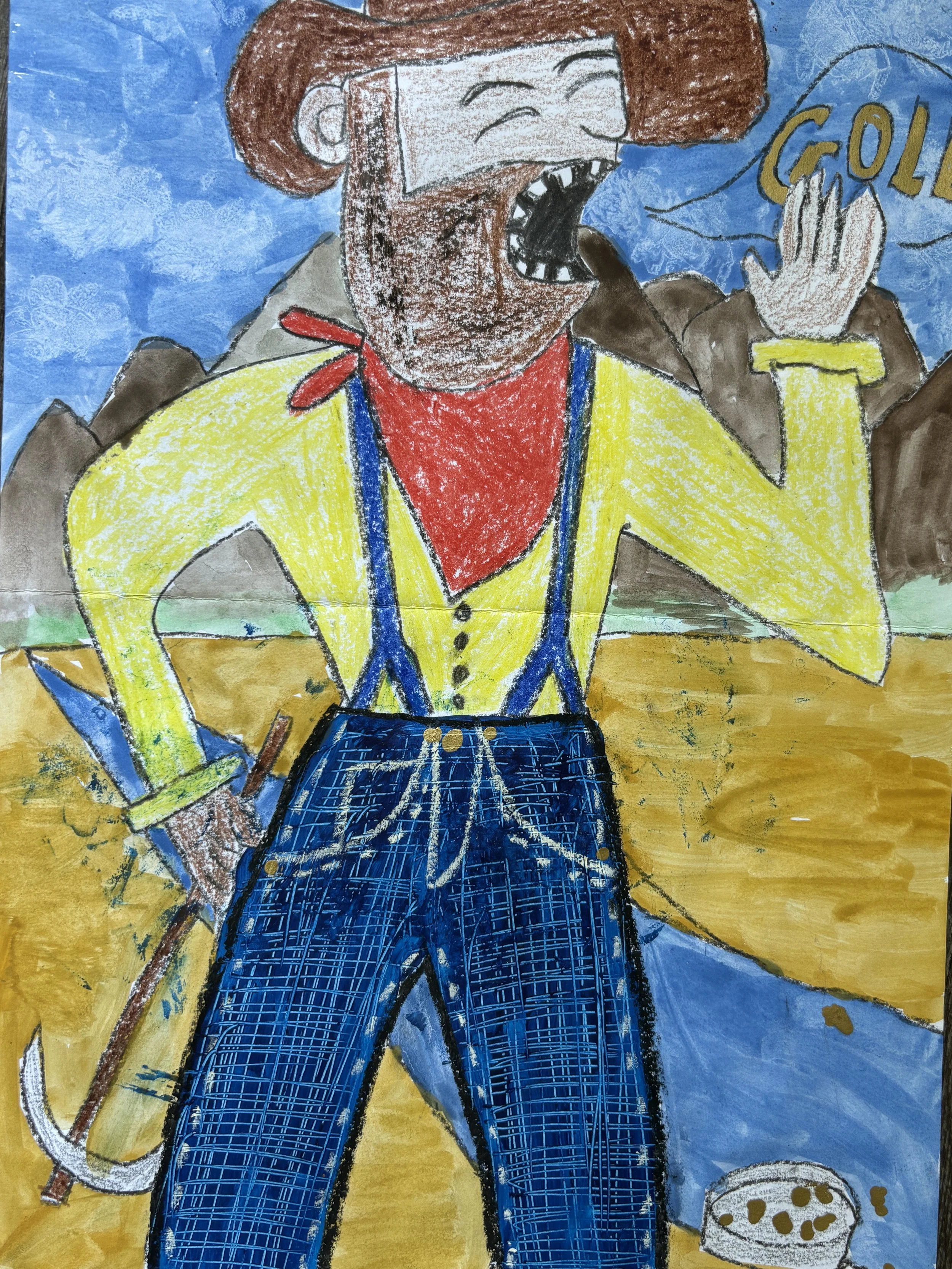 A colorful drawing of a cowboy with brown hair, a red bandana, yellow shirt, and blue jeans, holding a lasso and standing on a yellow and green landscape with blue sky and mountains in the background.