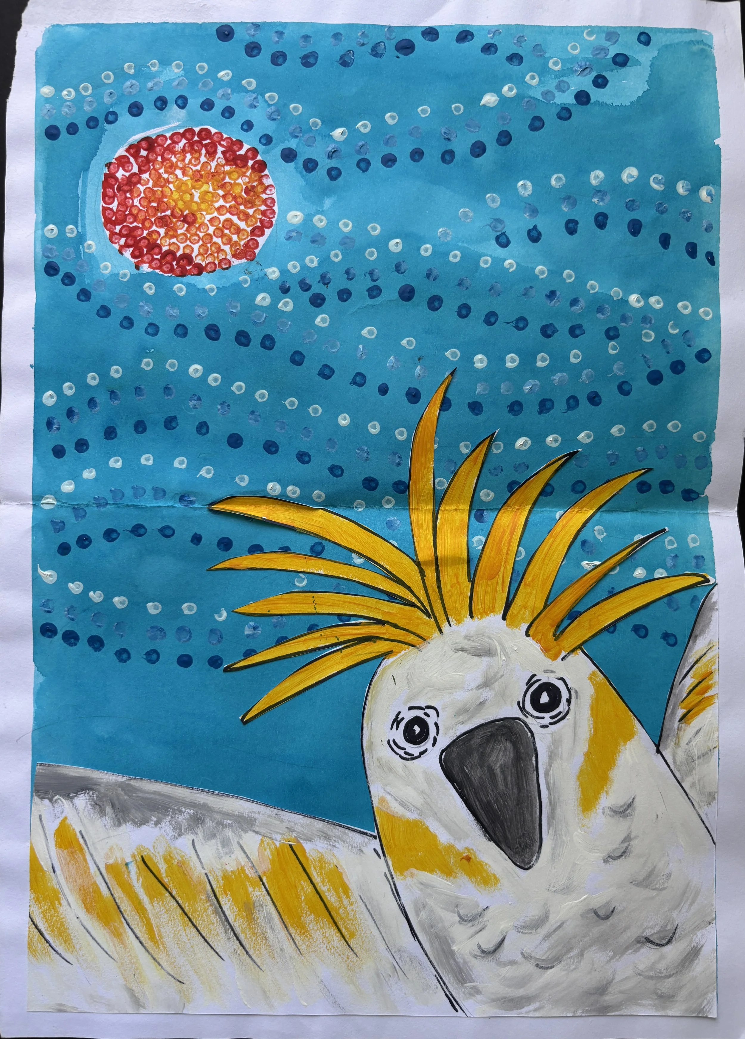 A colorful drawing of a cockatoo bird with a bright yellow crest, set against a blue sky with white and dark blue dots representing clouds or stars, and a red and orange sun in the top left corner.