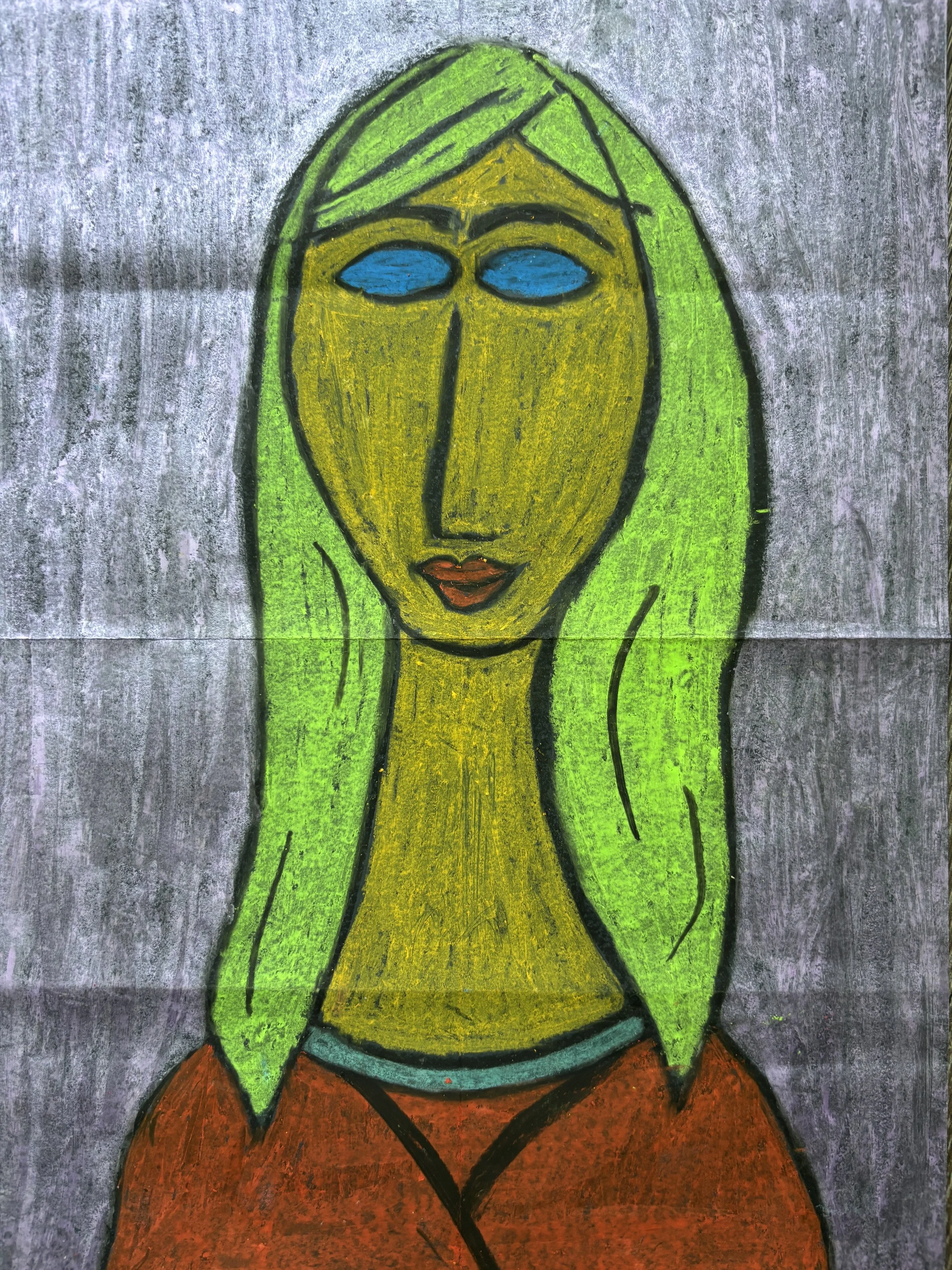 Colorful abstract drawing of a woman with green hair, yellow skin, blue eyes, and red lips, wearing a red top.