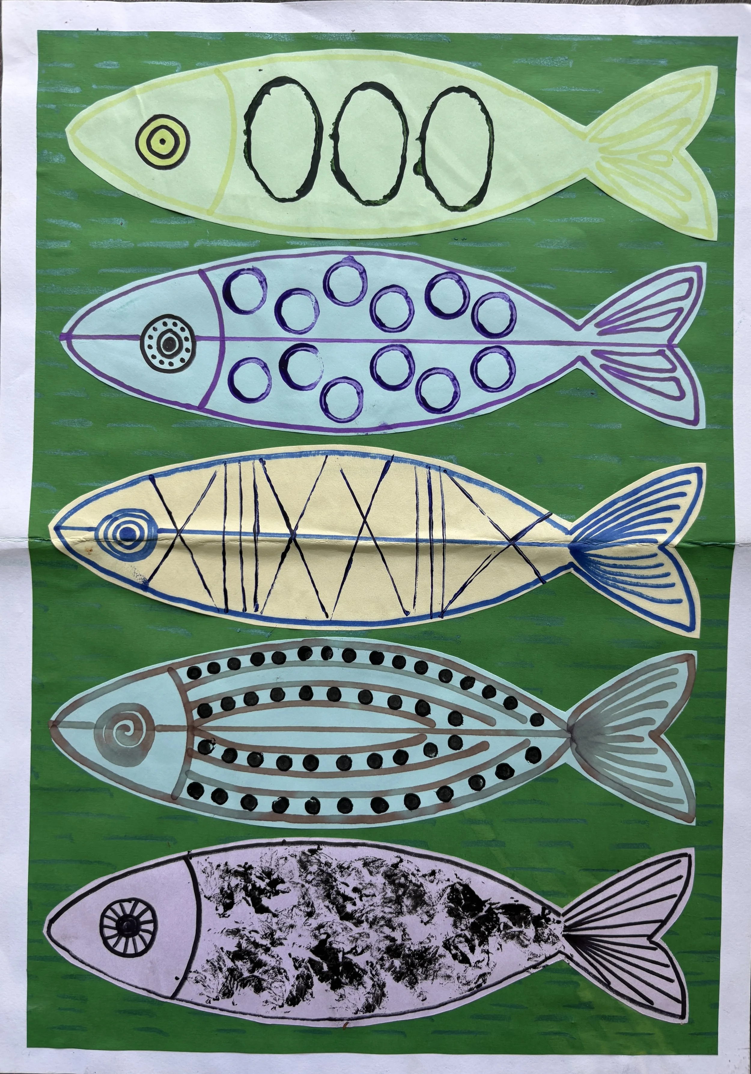 Colorful fish-themed artwork with six hand-drawn fish on a green background, each with unique patterns and colors.