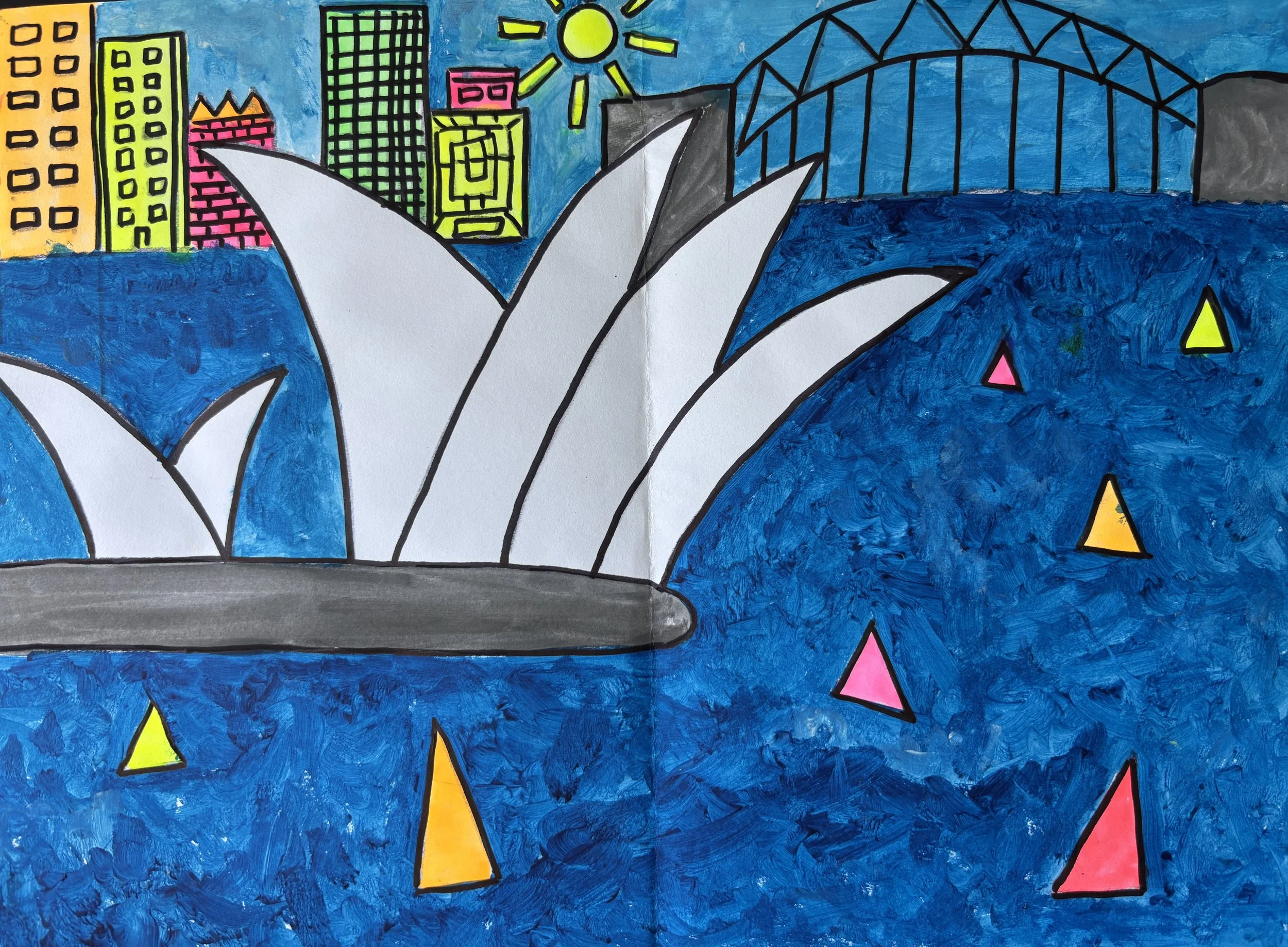 Colorful children's drawing of the Sydney Opera House with a city skyline and bridge in the background, blue water with pink, yellow, and orange sailboats, and a bright sun in the sky.