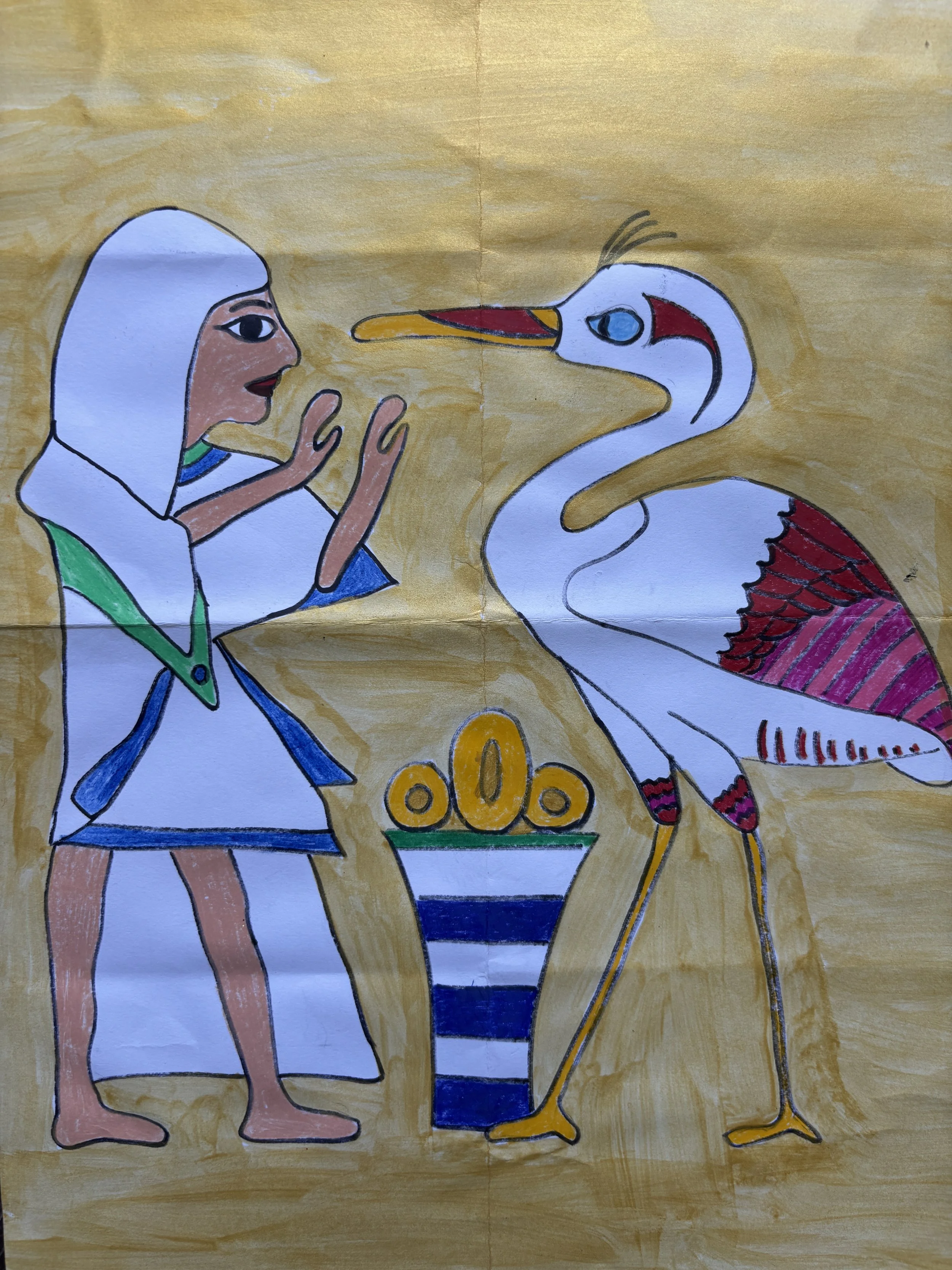A colorful drawing of a girl in a white and blue dress with a green scarf, standing beside a vase with yellow objects, facing a large white stork with red and black feathers, on a yellow background.