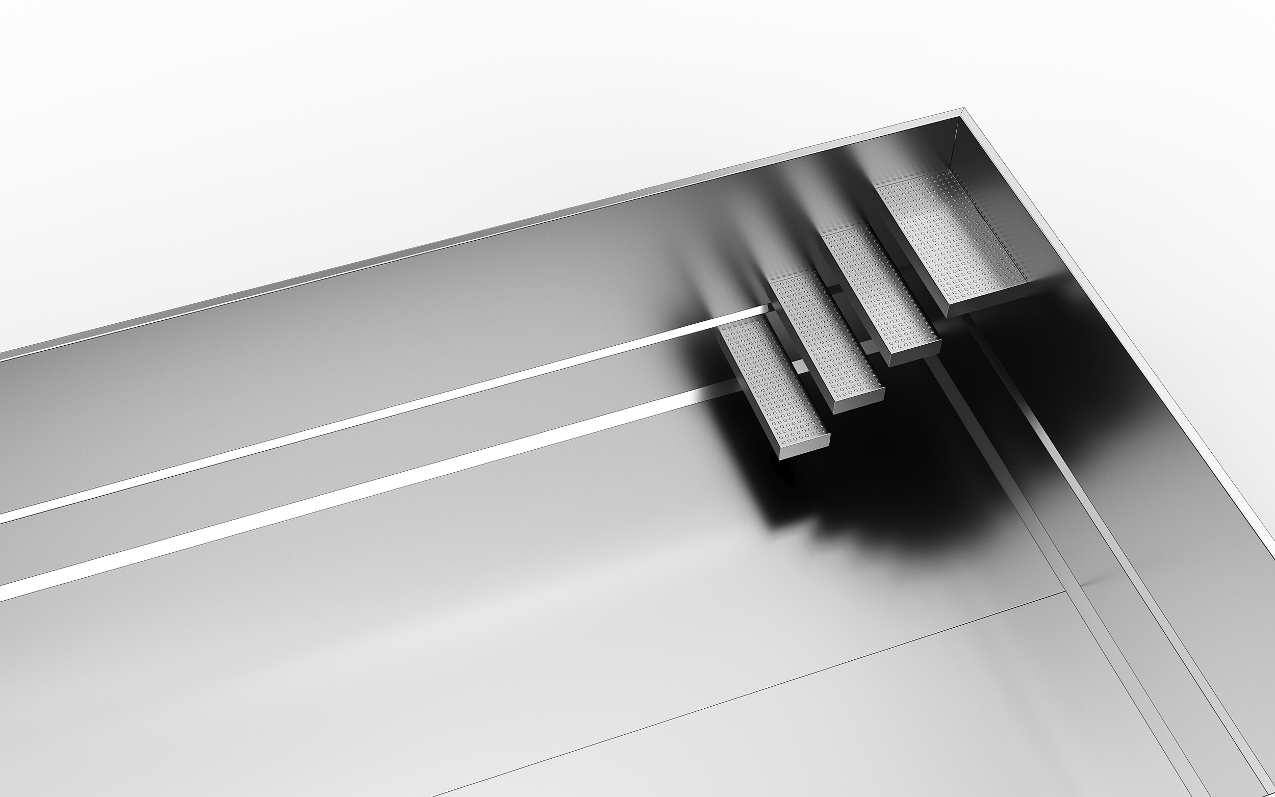 Close-up of a silver metallic cabinet with four small perforated drawers visible in the corner.