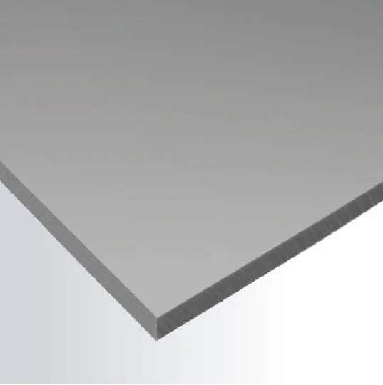 Close-up of a metallic or reflective surface with a beveled edge.