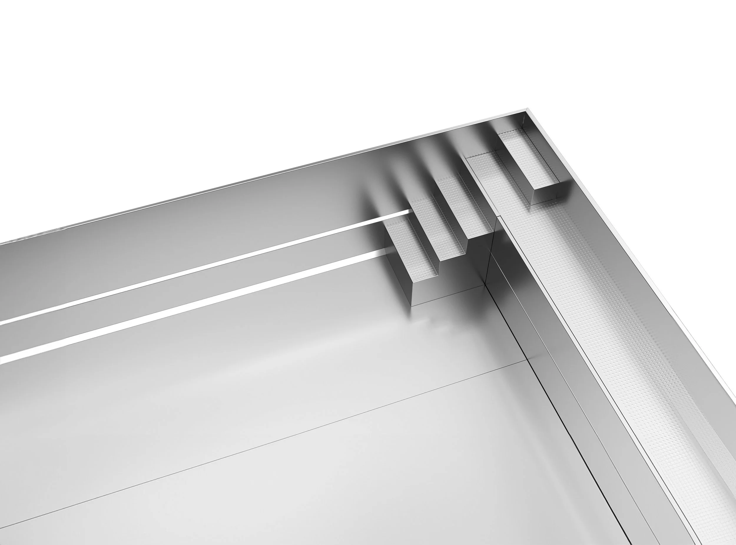Close-up of a metallic corner with steps and lights, in a modern architectural setting.