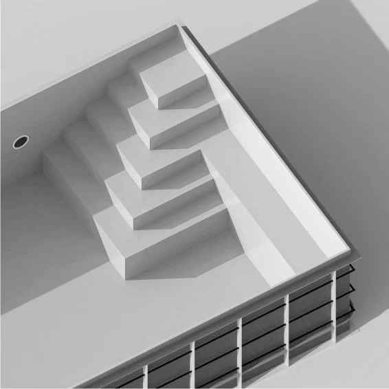 Interior view of a modern swimming pool with a built-in staircase and a storage area below.