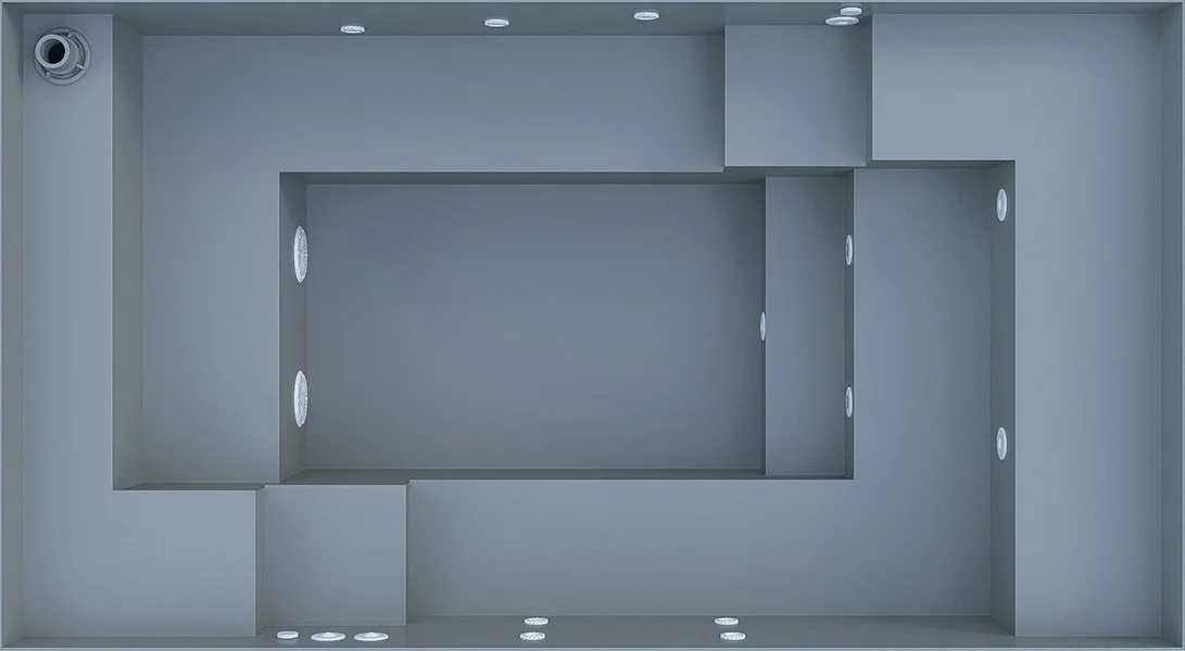 Empty walk-in freezer interior with insulated walls, ceiling, and floor, and built-in lighting.