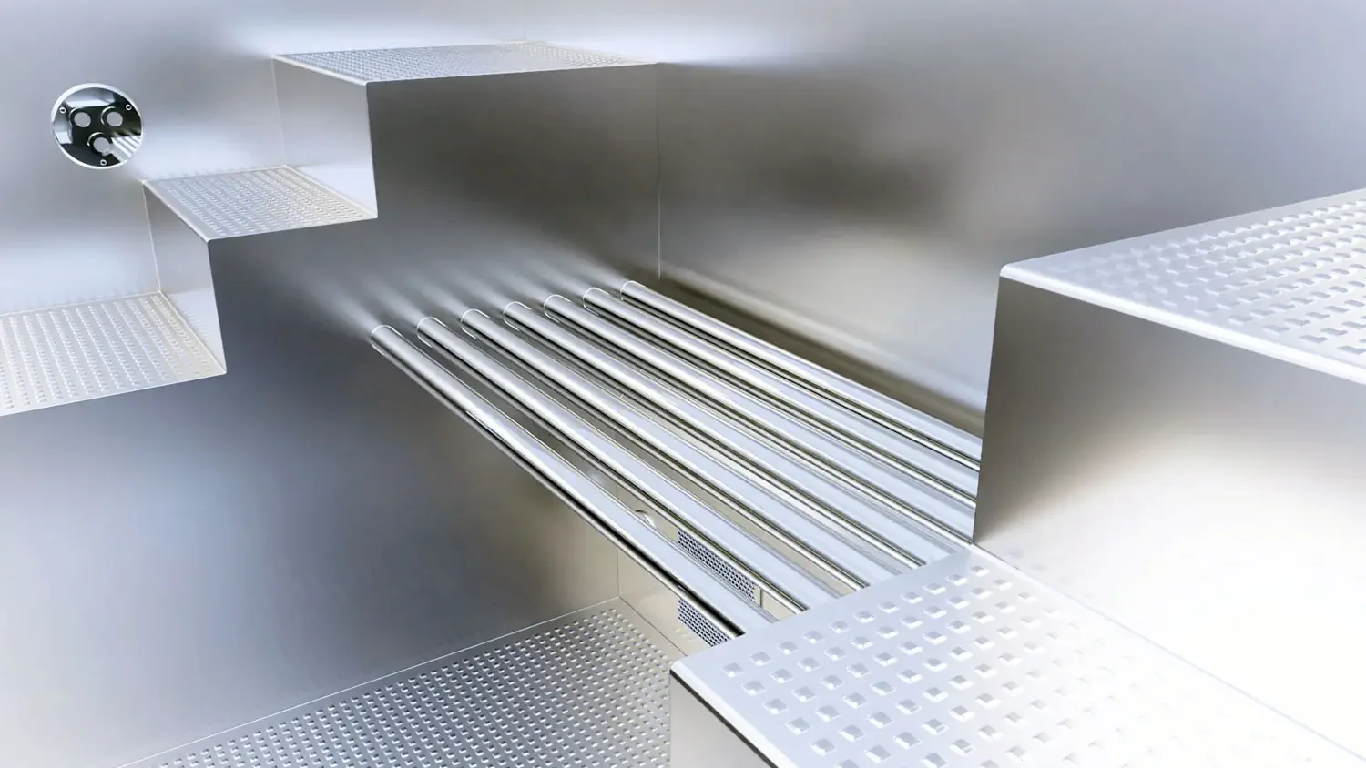 A stainless steel, modern, empty oven or grilling station with a grill rack and textured surface for cooking or preparation.