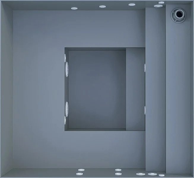 Empty gray electrical or utility box with circuit openings and wiring access points.