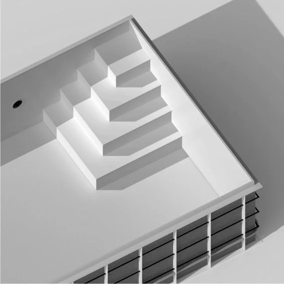 A grayscale 3D model of a building interior with stairs leading to a platform, featuring a circular window and shelving units along the bottom wall.