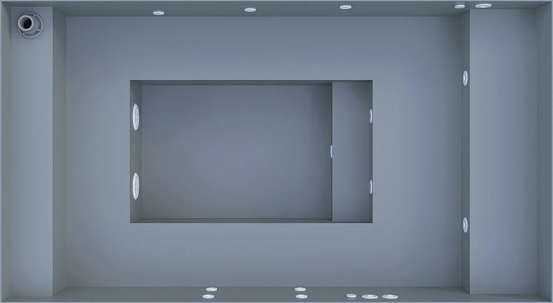 Top-down view of a gray, empty room or enclosure with several small circular lights embedded in the walls and ceiling.