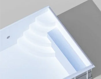 Close-up of a white staircase with built-in LED lighting along the edge.