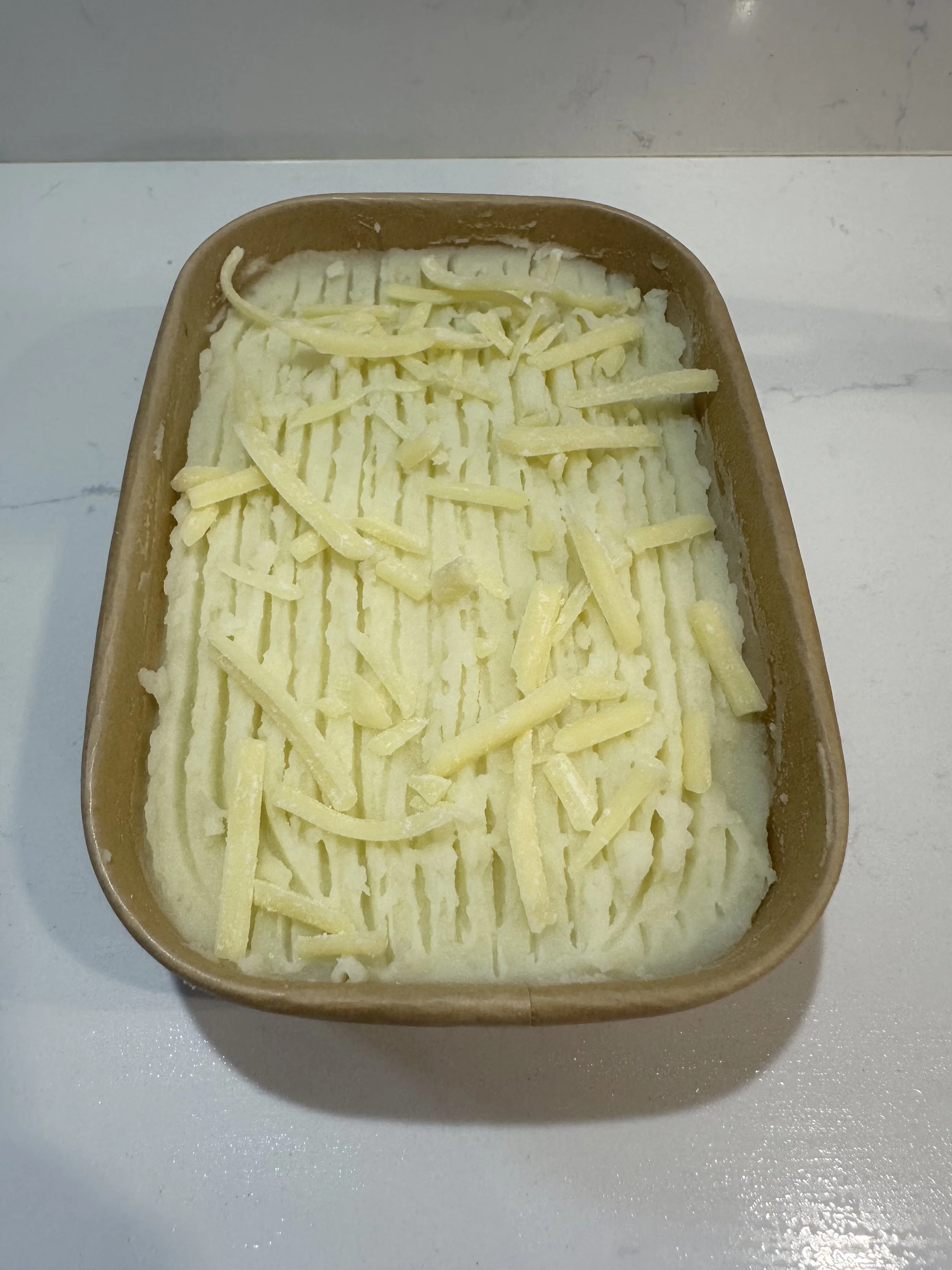 Caramelized Leek, Sausage and Cheesy Mash Pie