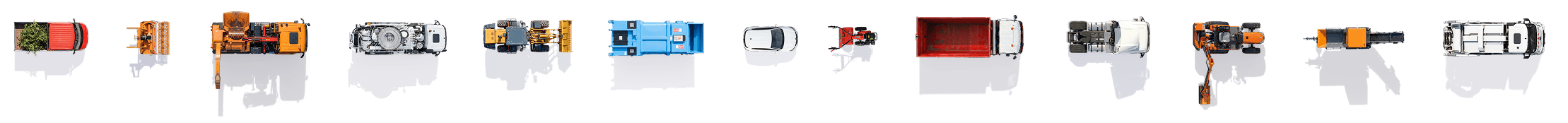 Une collection de divers véhicules, incluant des camions, un chariot élévateur, un véhicule de nettoyage, et d'autres véhicules utilitaires, alignés côte à côte.