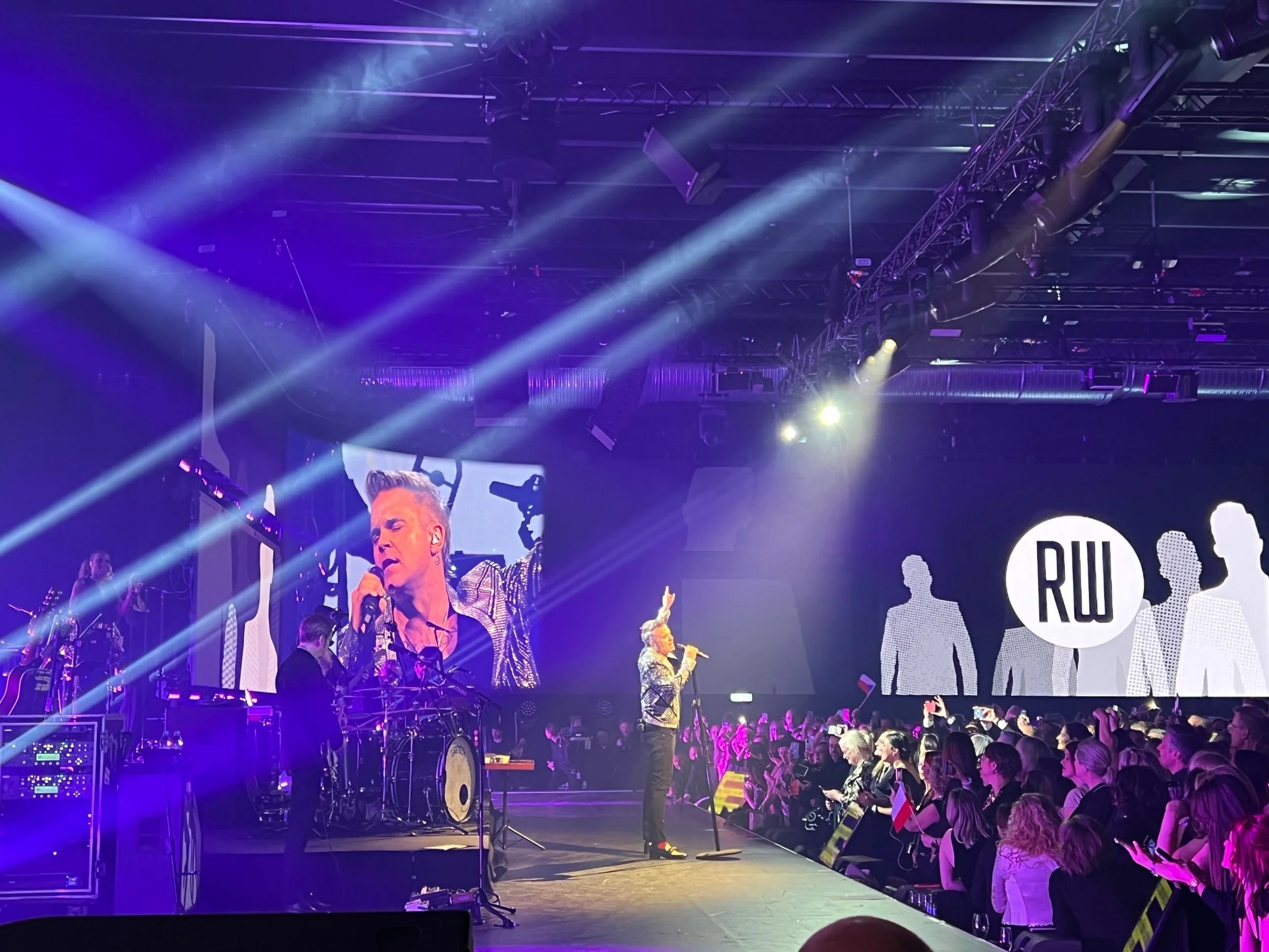 Robbie Williams entertains in London