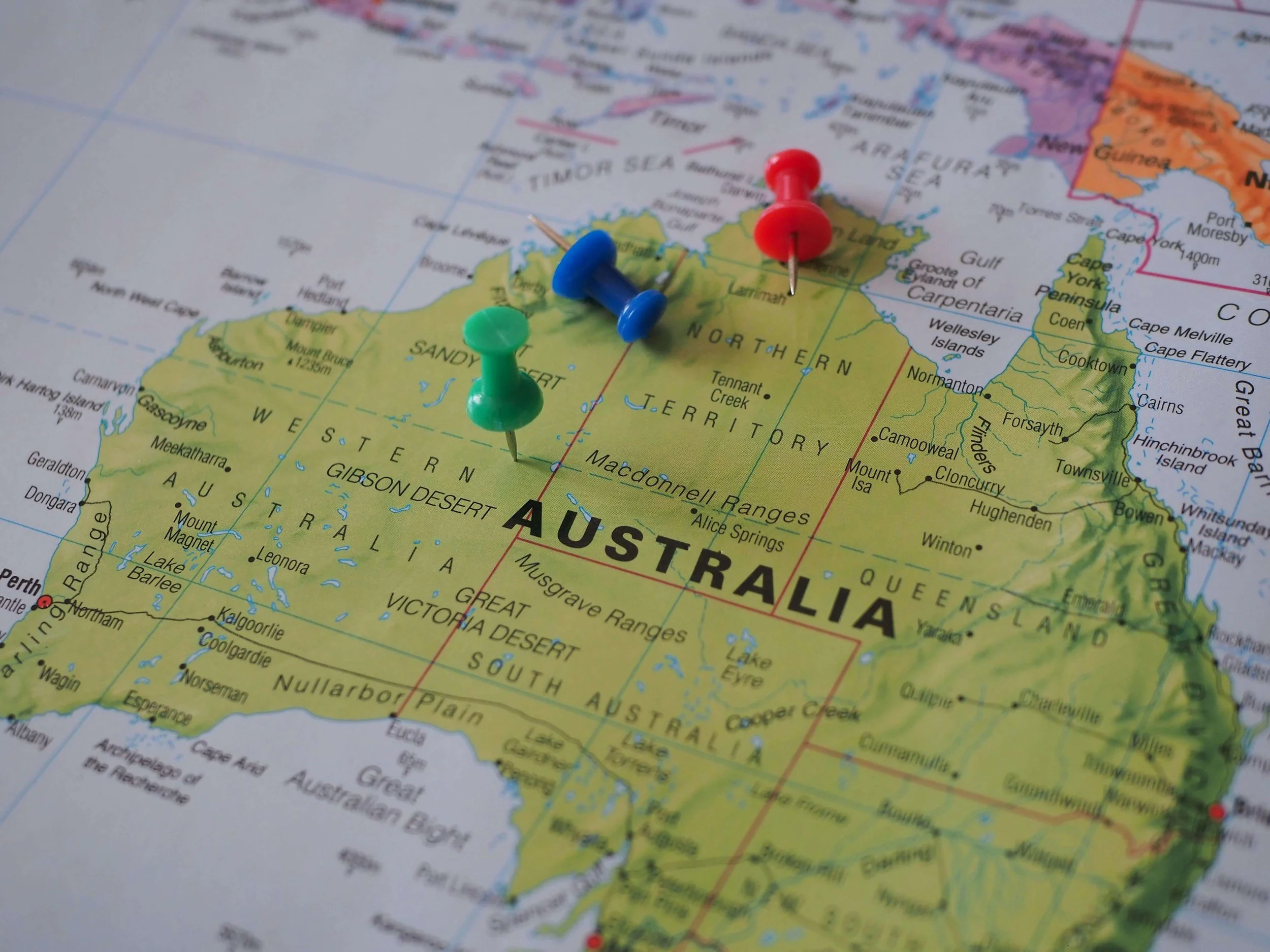 Map of Australia with colored push pins marking specific locations.
