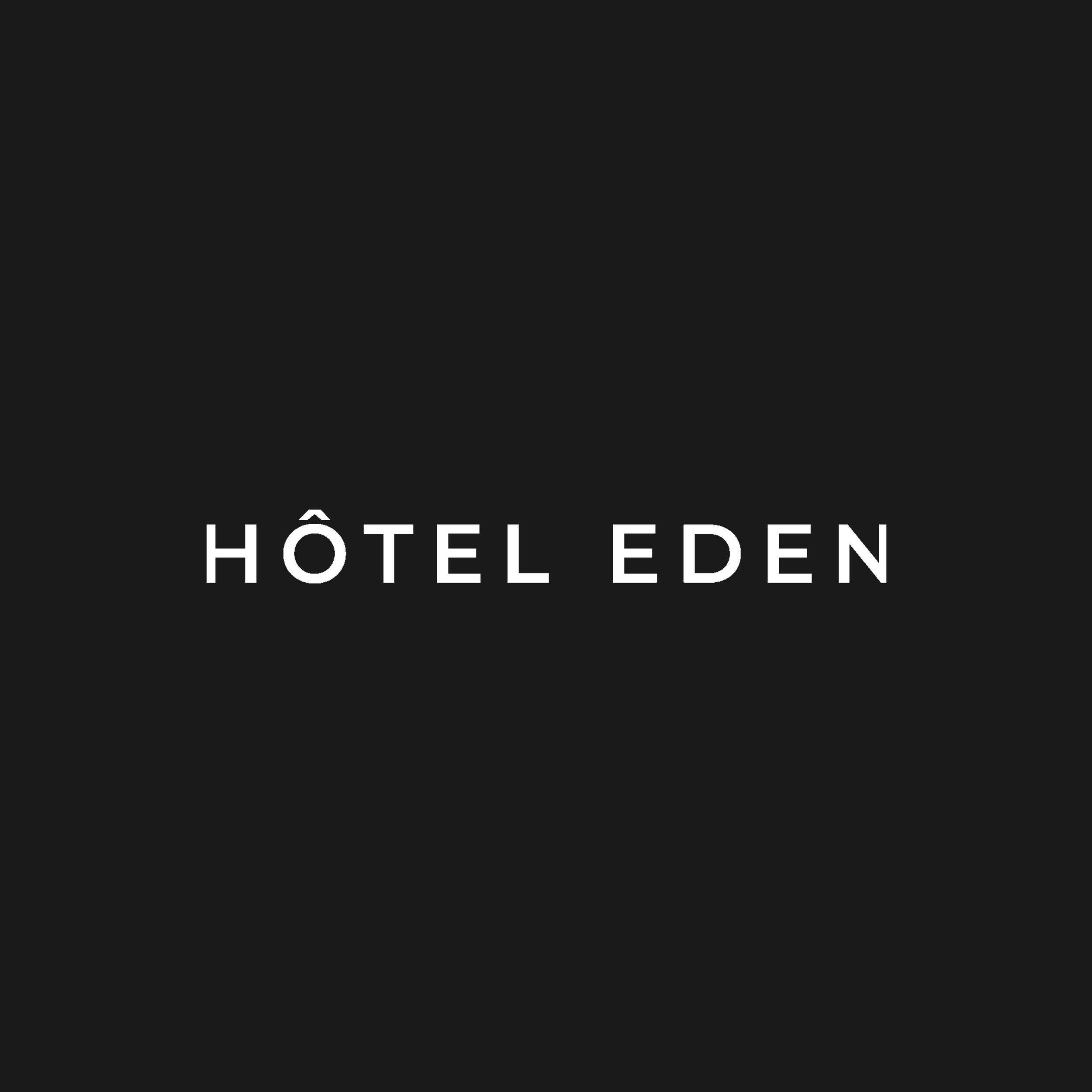 Black background with white text reading "HÔTEL EDEN".