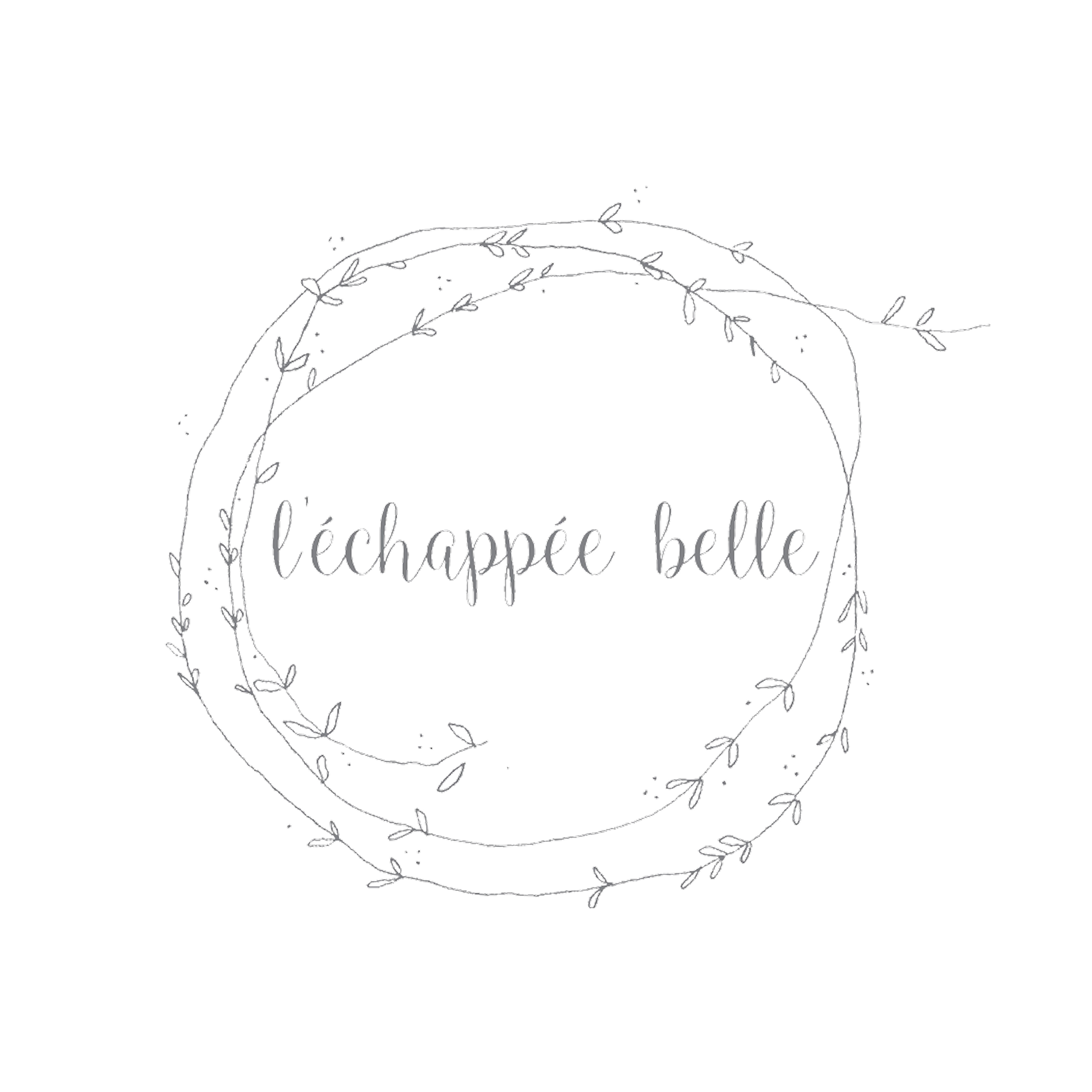 Minimalist black and white logo with the text 'l'échappée belle' surrounded by a hand-drawn circular wreath of vines and leaves.