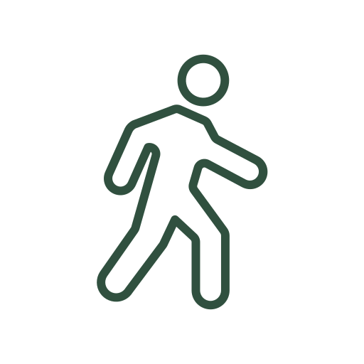 Dark background with a spotlight shining on the words 'COMING SOON' in bold black letters, casting a shadow on the surface below.