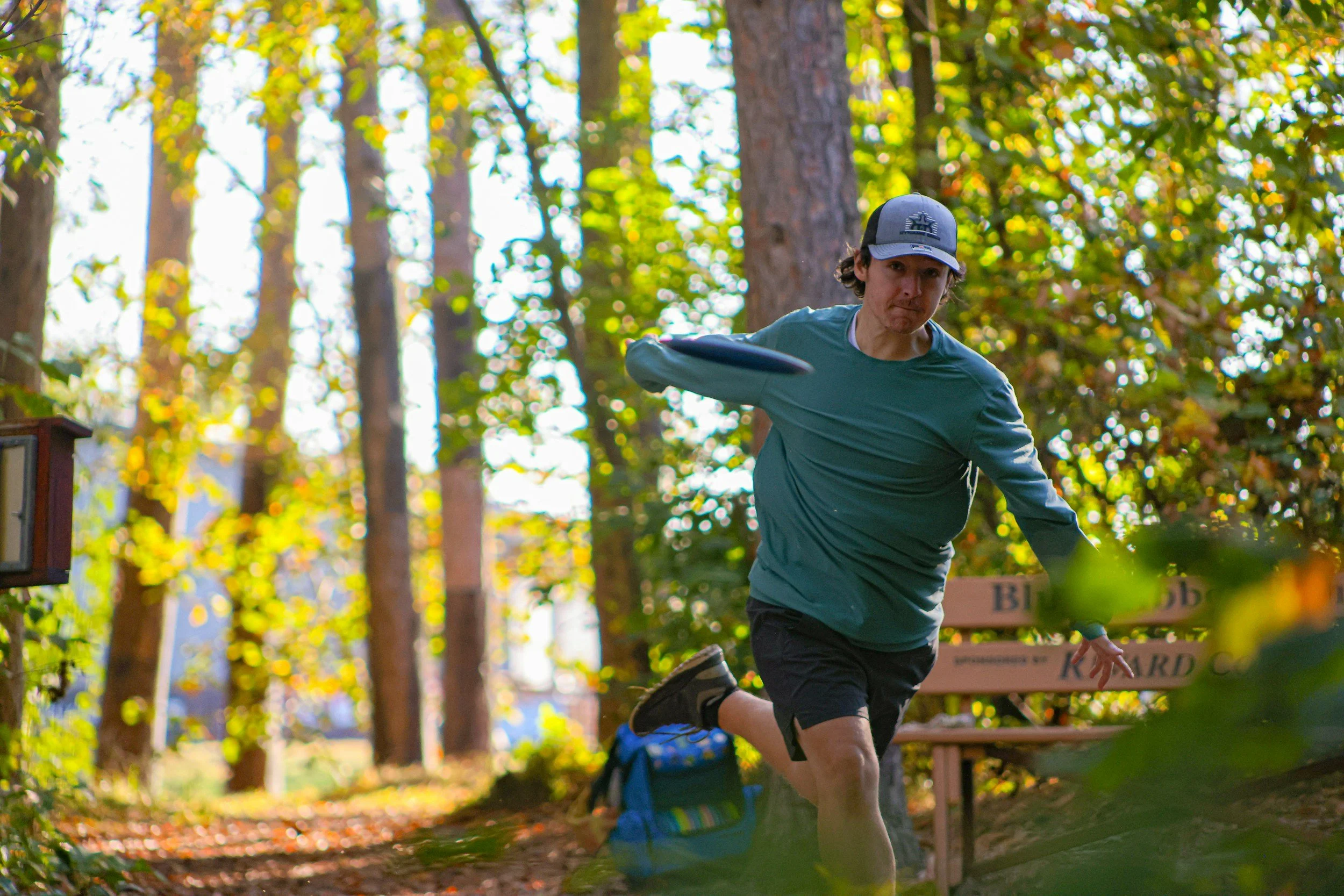 Person playing disc golf