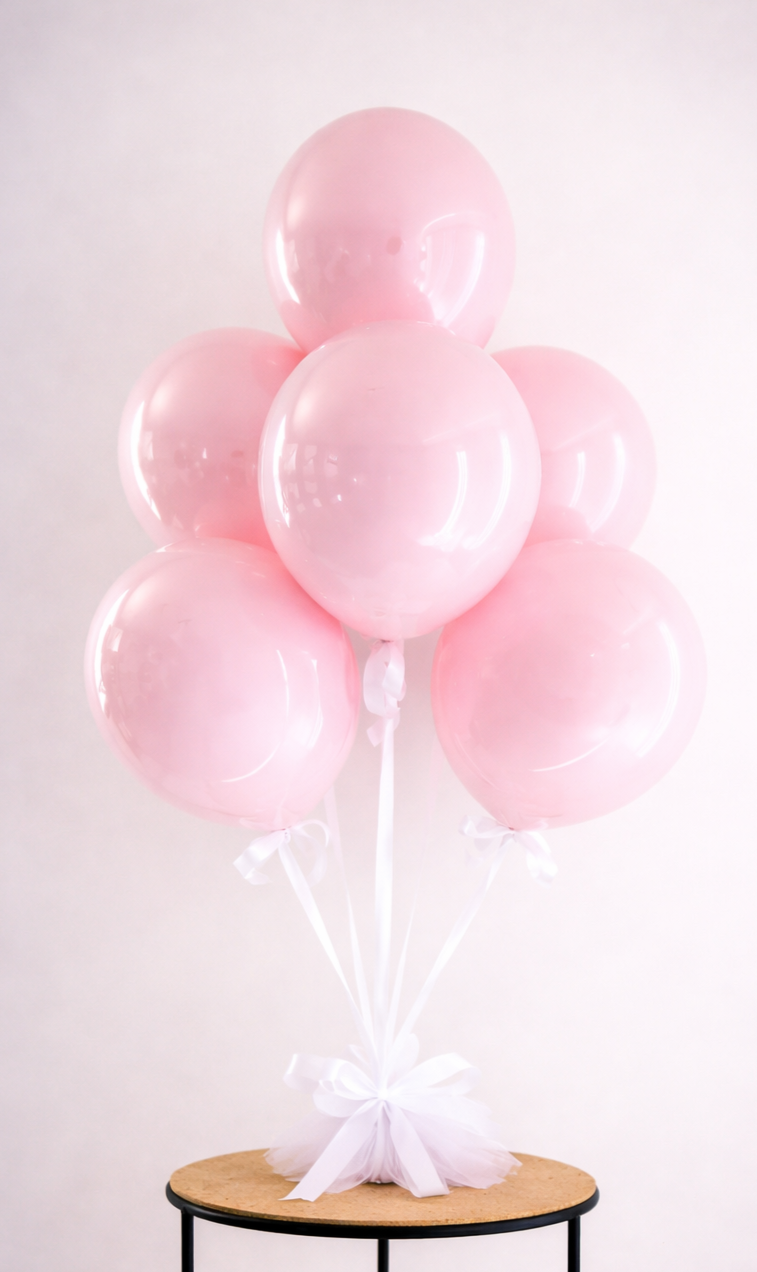 Pastel%2Bpink%2Bballoon%2Bbouquet%2Bon%2Btable.png