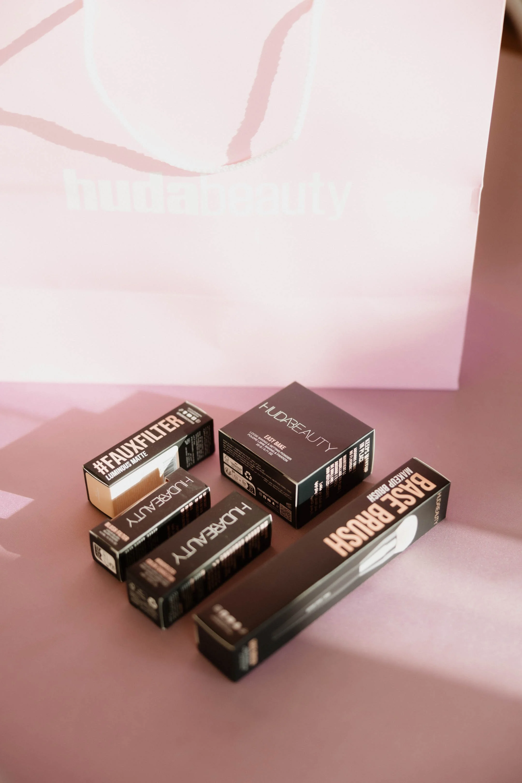 On-site event photography and live editing for HUDA Beauty brand event