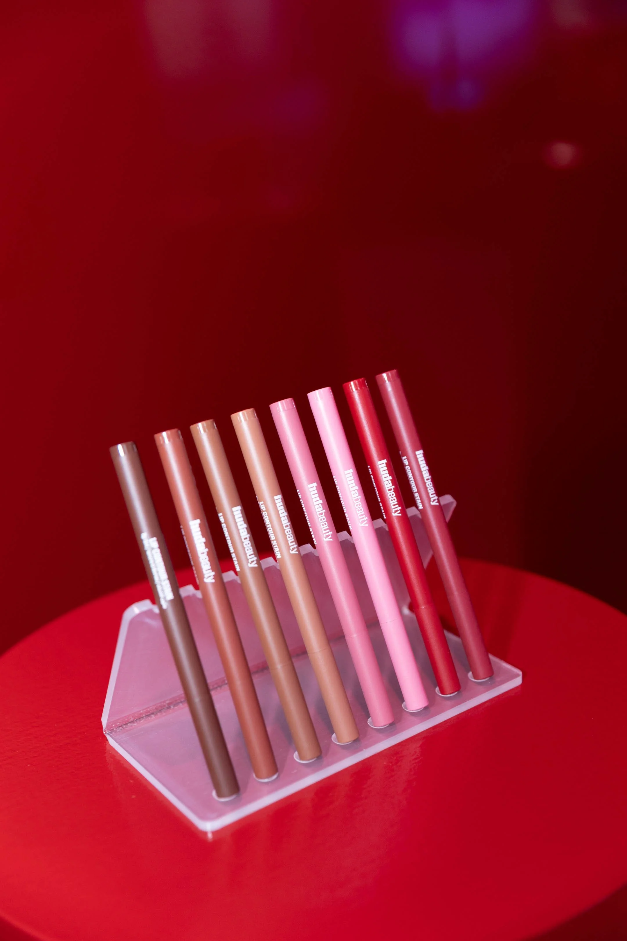 On-site event photography and live editing for HUDA Beauty brand event