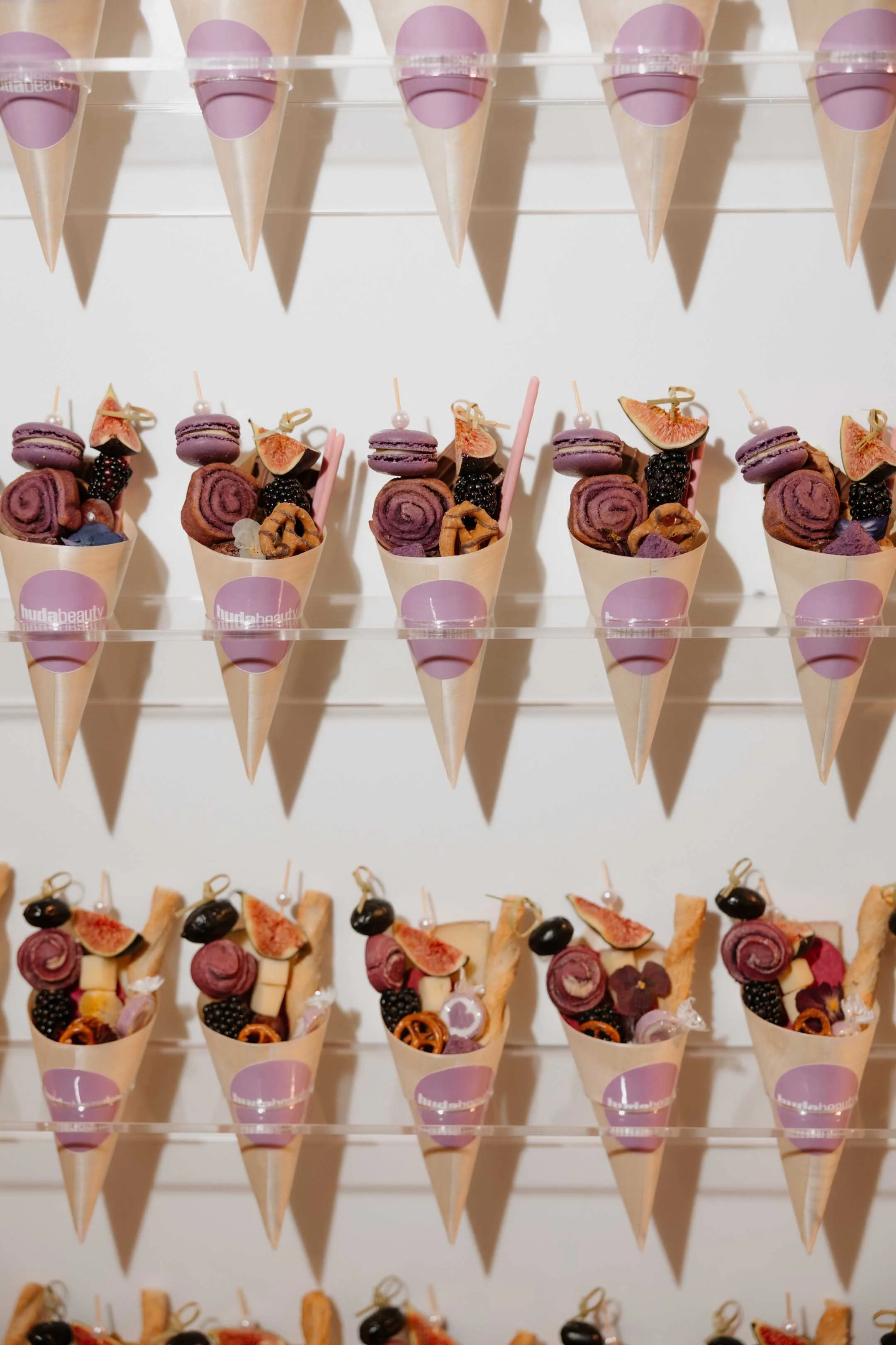 On-site event photography and live editing for HUDA Beauty brand event