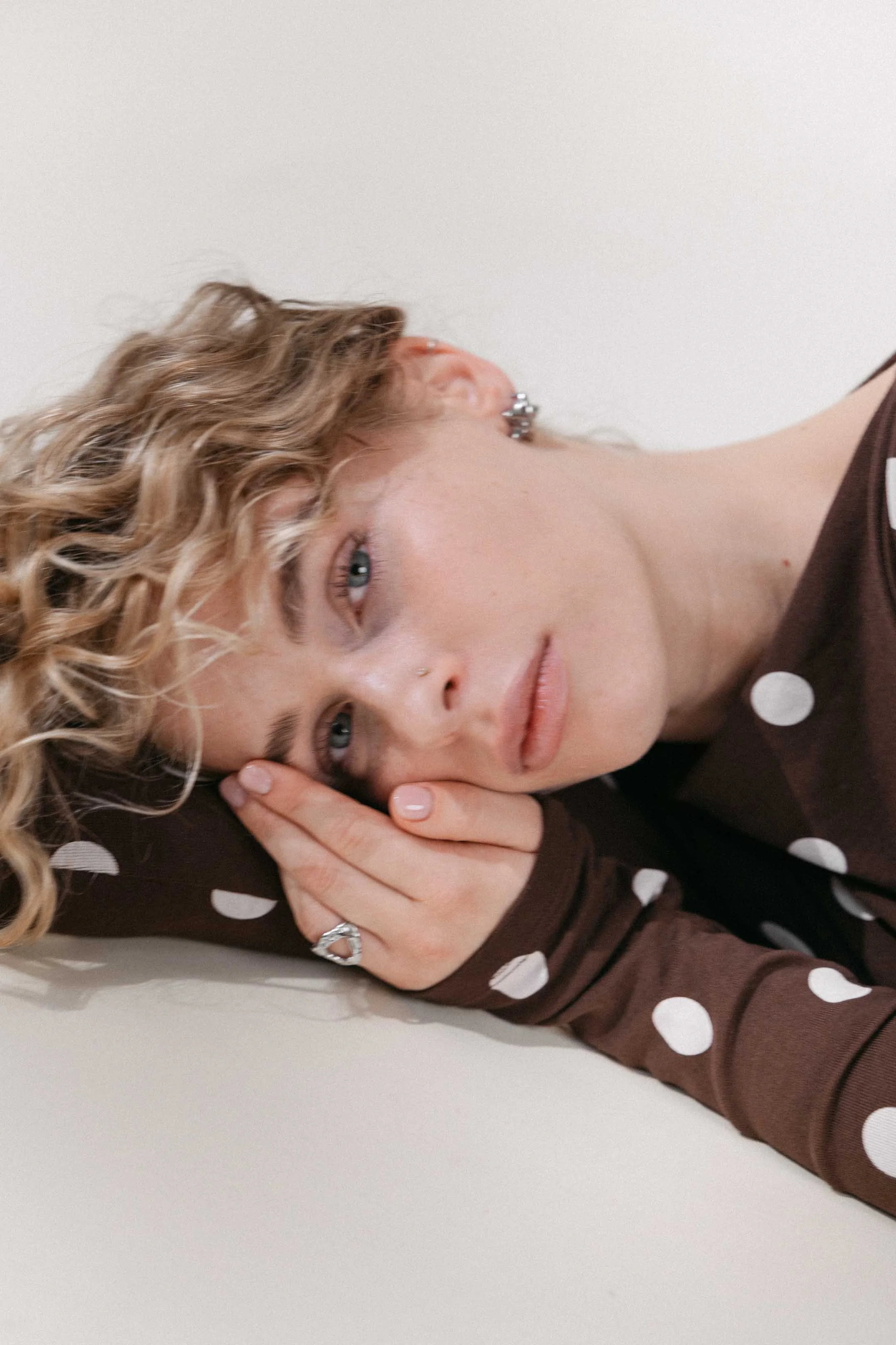 Fashion and jewelry editorial shoot with refined studio lighting