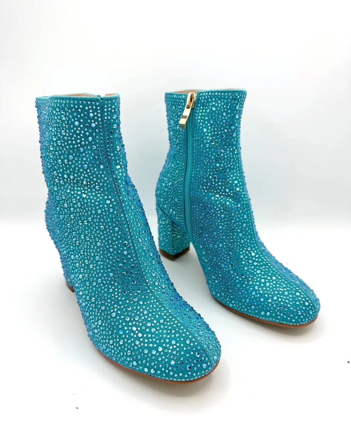 TEAL BOOTS 1.jpeg