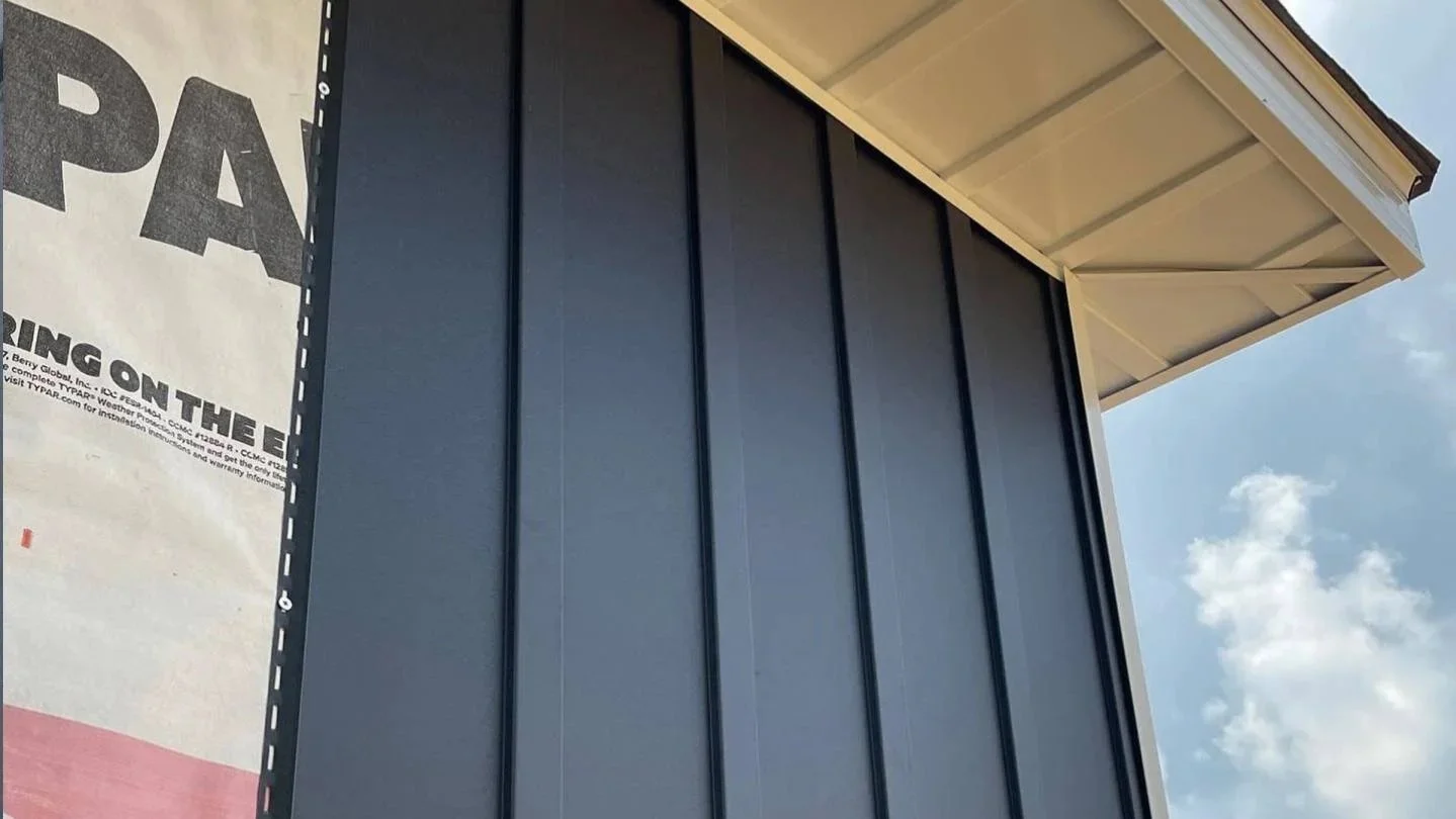 2x6 WOOD FRAMED EXTERIOR WALLS WITH VERTICAL METAL SIDING