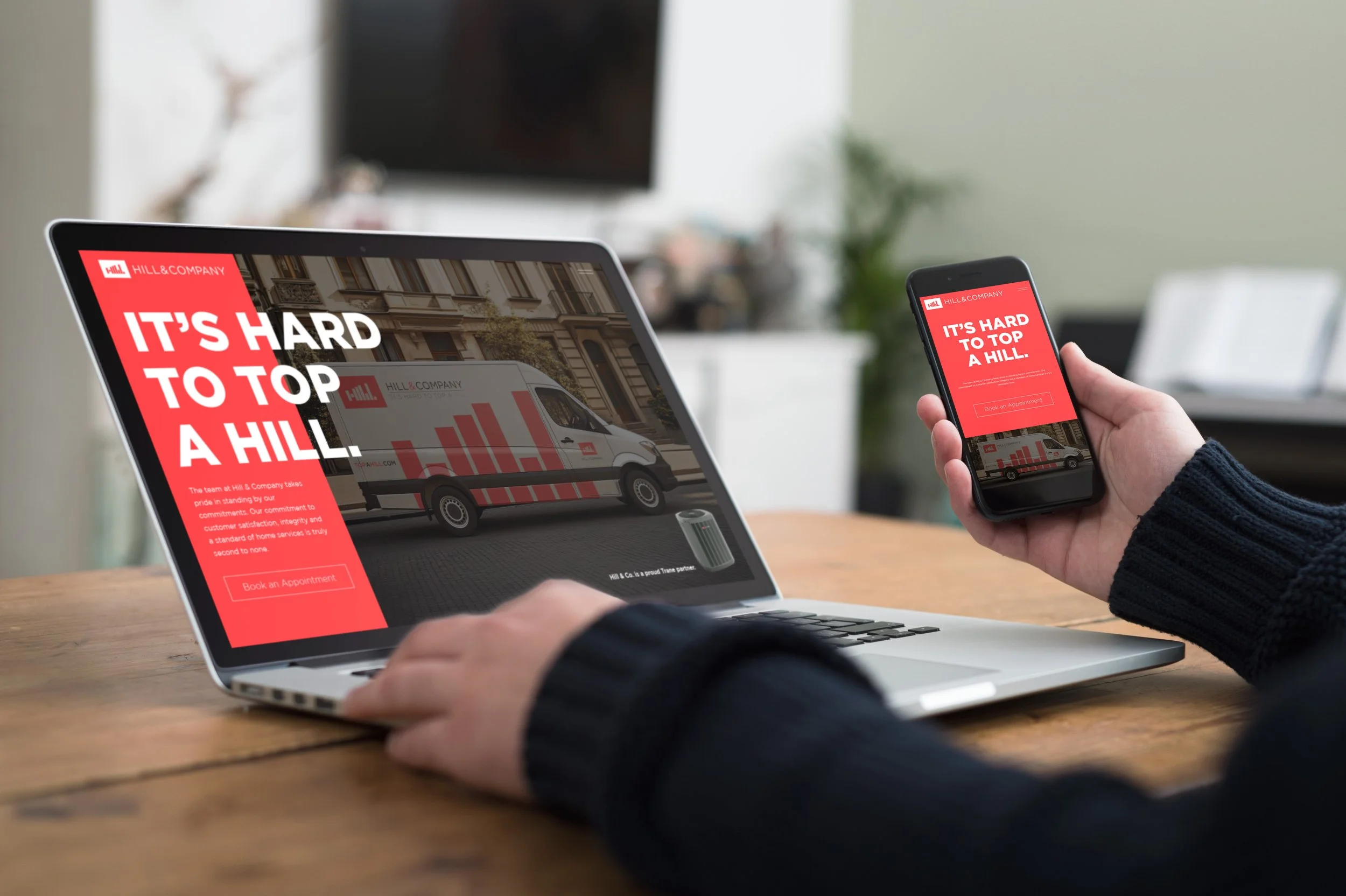 An image of Hill & Company desktop and mobile websites.