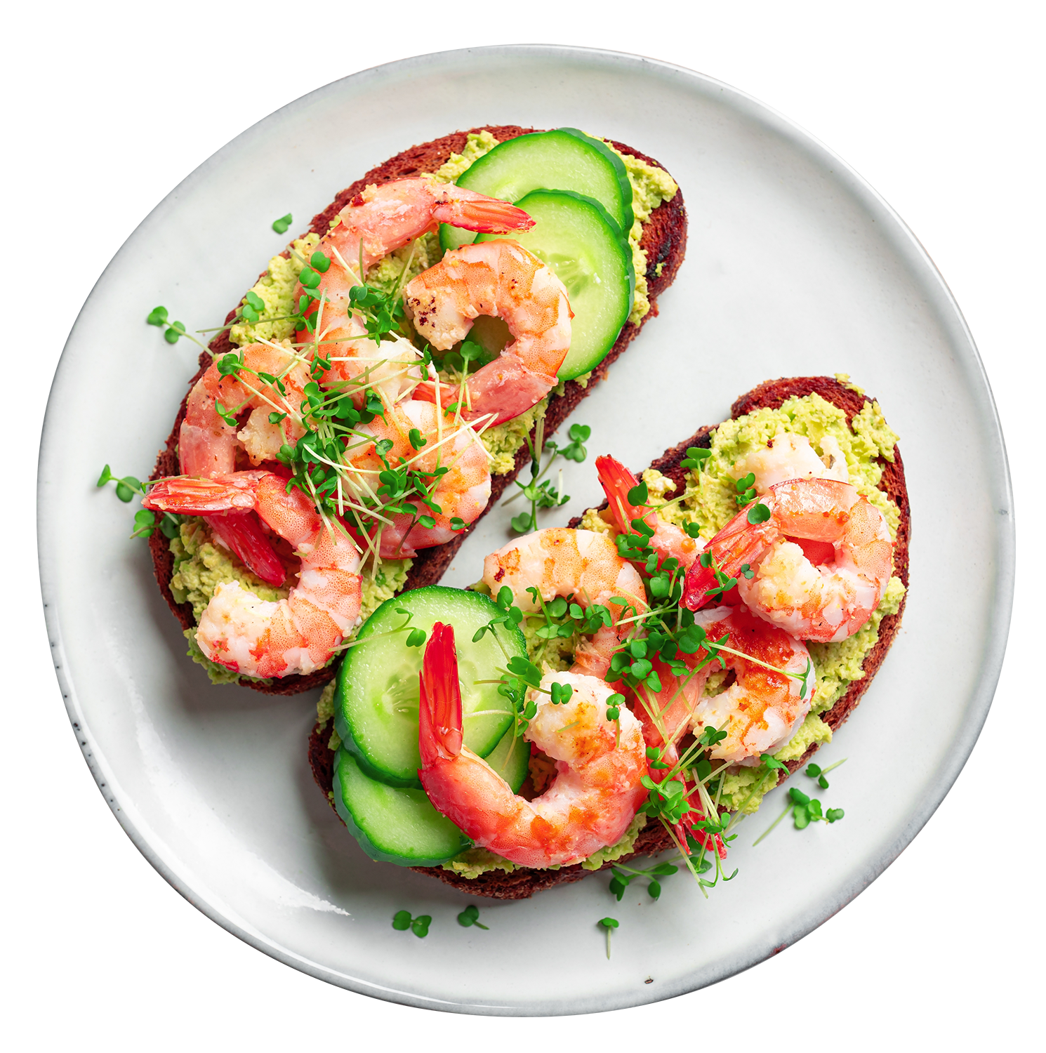 Two pieces of toast topped with mashed avocado, cooked shrimp, sliced cucumber, and microgreens on a white plate.