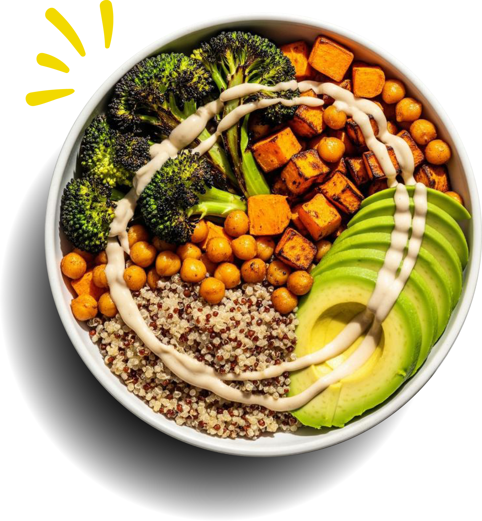 A white bowl filled with broccoli, sweet potato cubes, chickpeas, avocado slices, quinoa, and drizzled with a creamy dressing.
