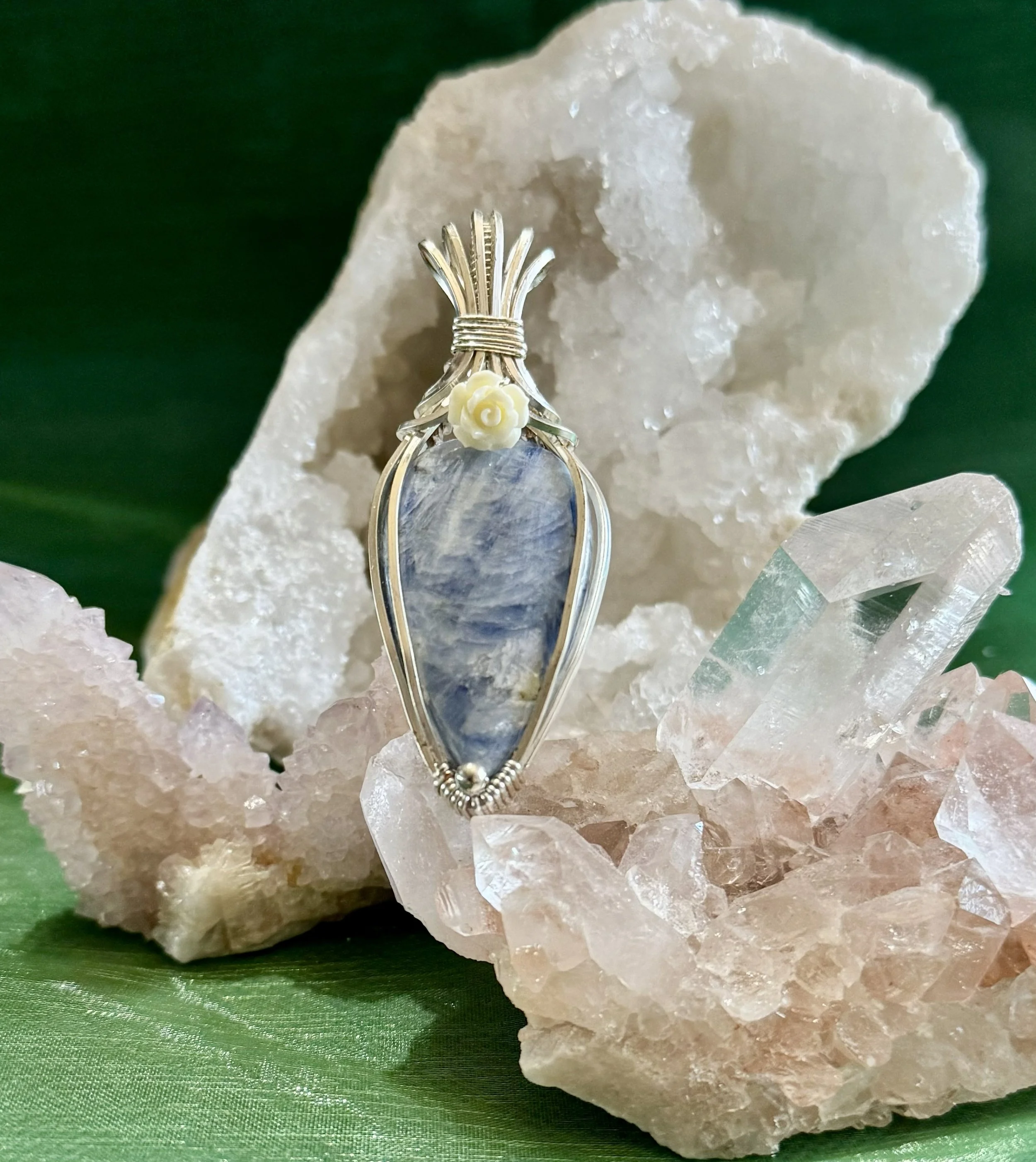 Blue Kyanite with rose accent wrapped in silver filled wire