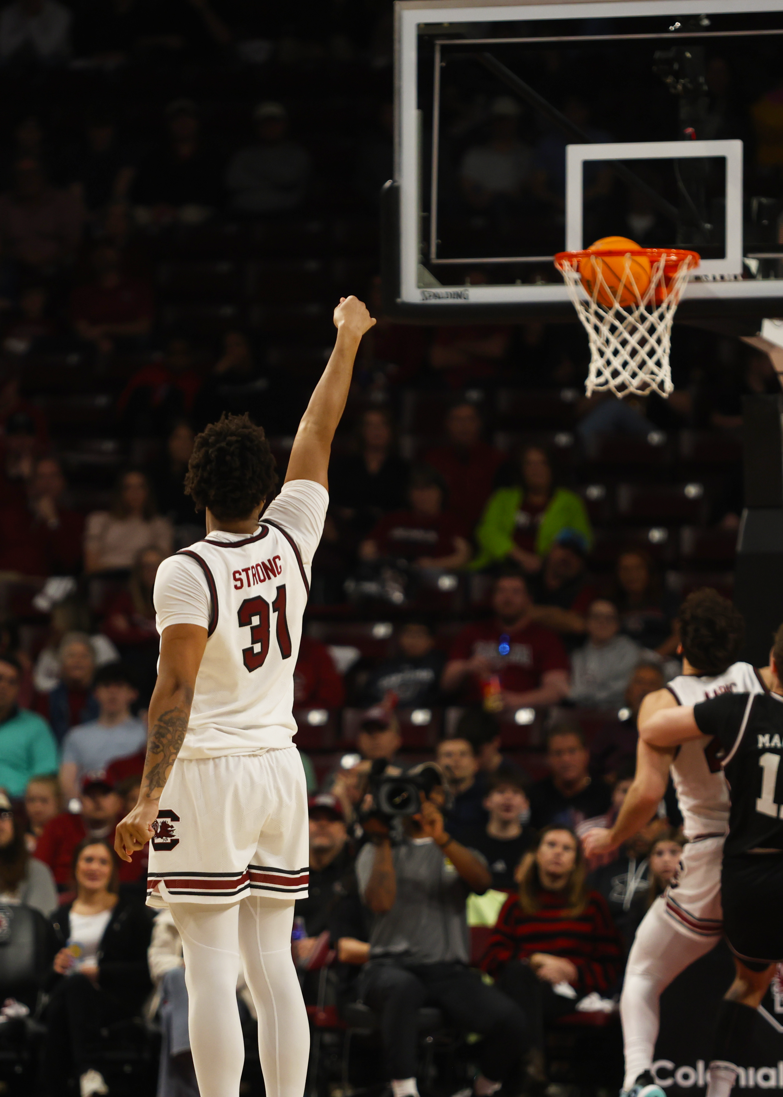 University of South Carolina Junior forward, Elijah Strong (#31), connects from beyond the arc at Colonial Life Arena, successfully shooting a three-pointer and adding to South Carolina’s offensive effort in a 97–89 win over Mississippi State.