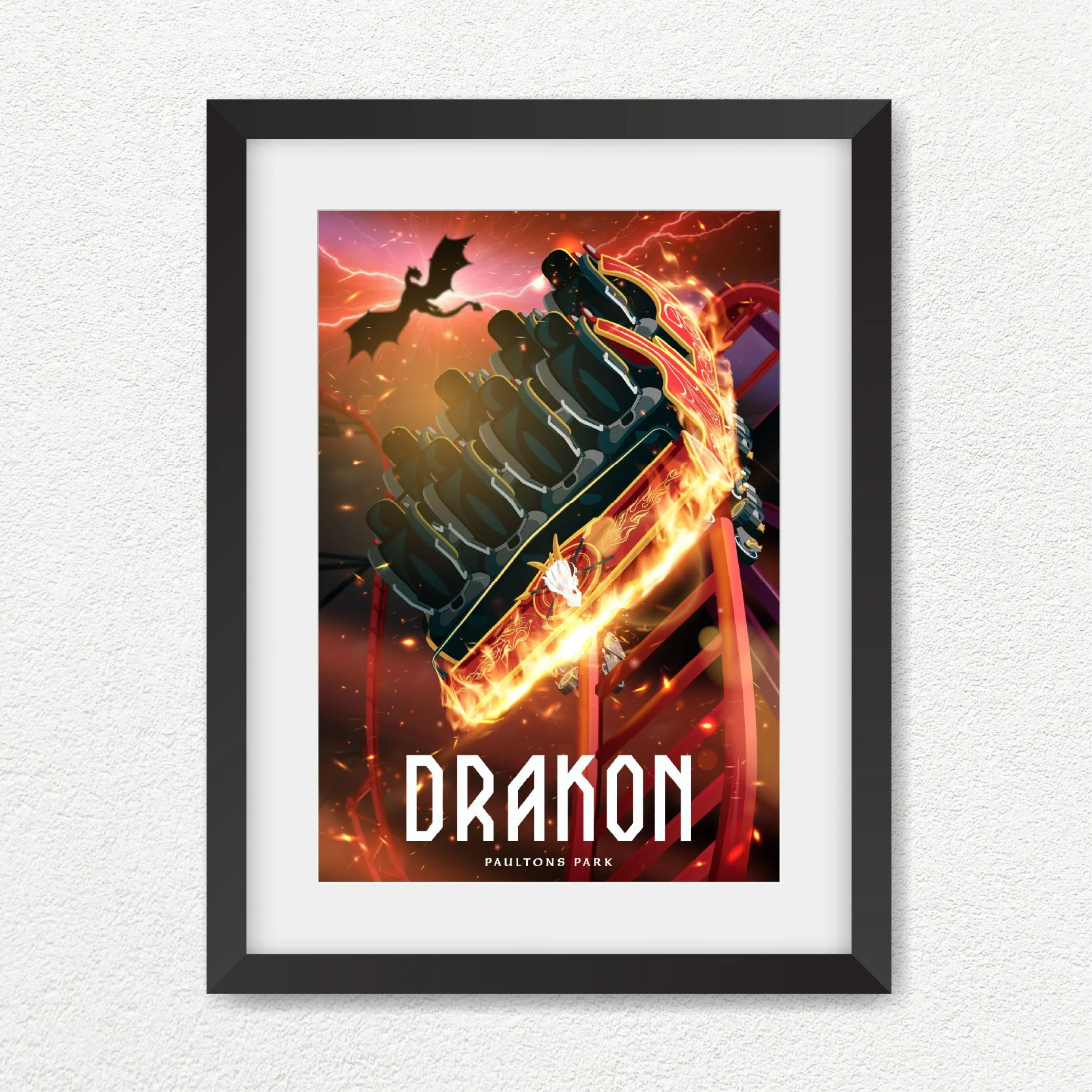 Poster featuring a theme park ride Drakon with fiery effects and a dragon silhouette flying in the background, with the text 'DRAKON' and 'PAULTON'S PARK' at the bottom.