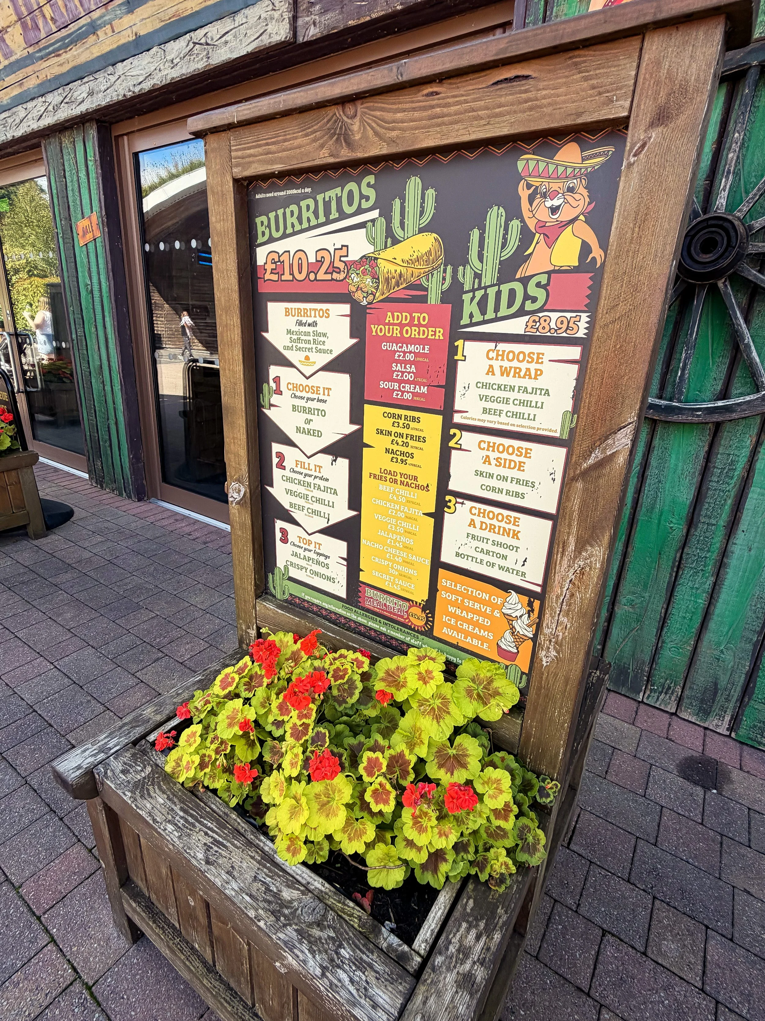 Rustic looking menu design for Hay Barn featuring burritos, cacti and Mexican groundhog