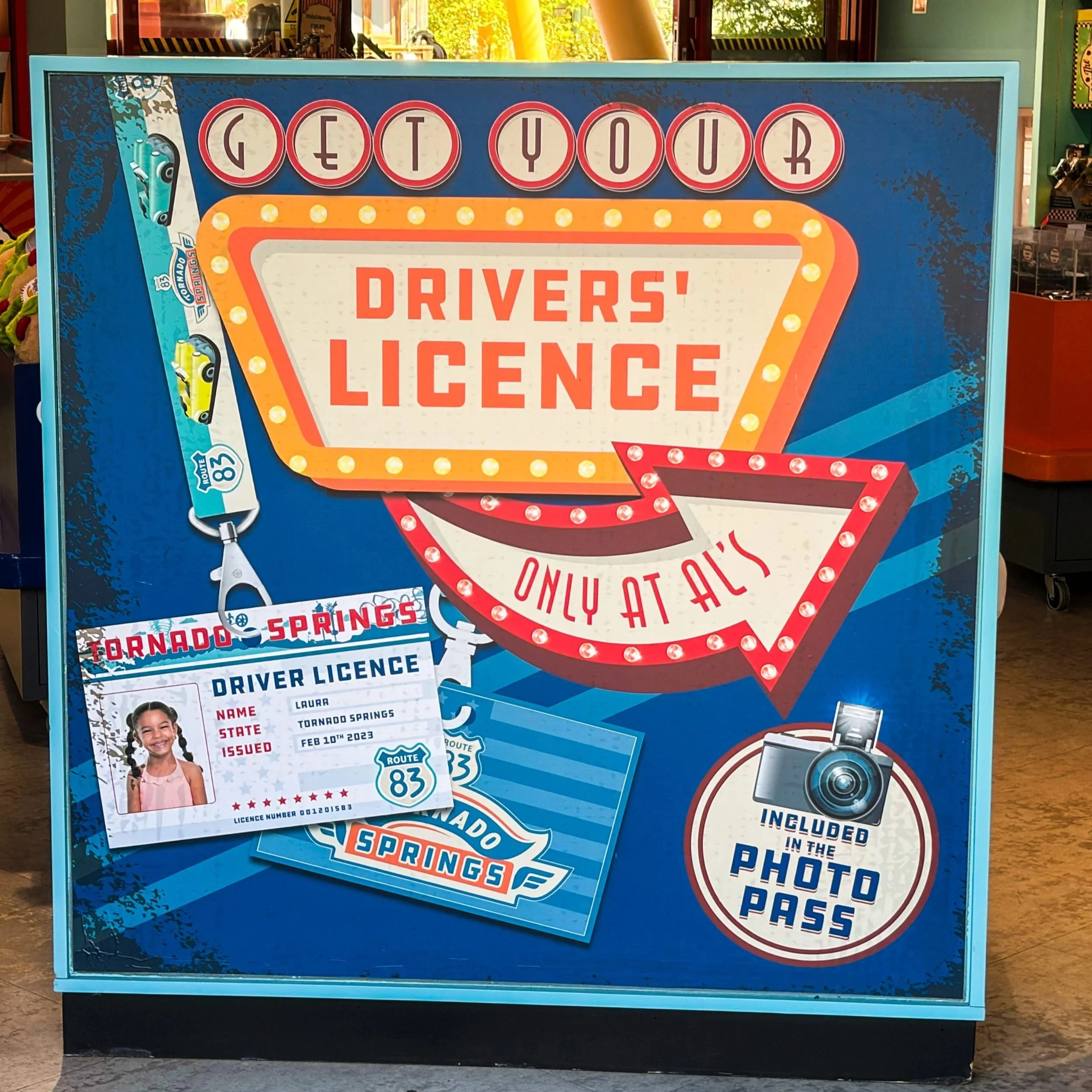 Photo of sign in retro 50s style advertising Tornado Springs Drivers' Licence